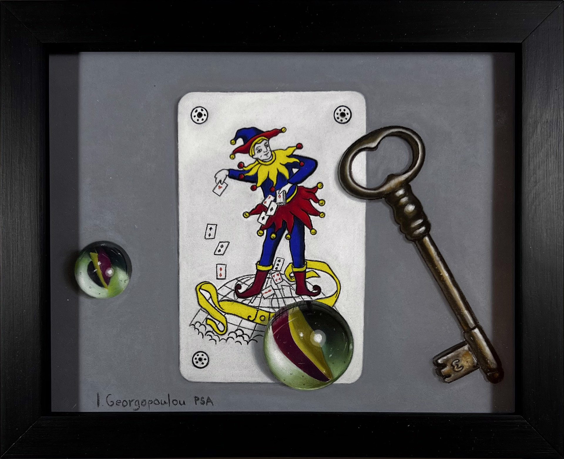 A drawing of a joker playing card next to a key and a glass ball.