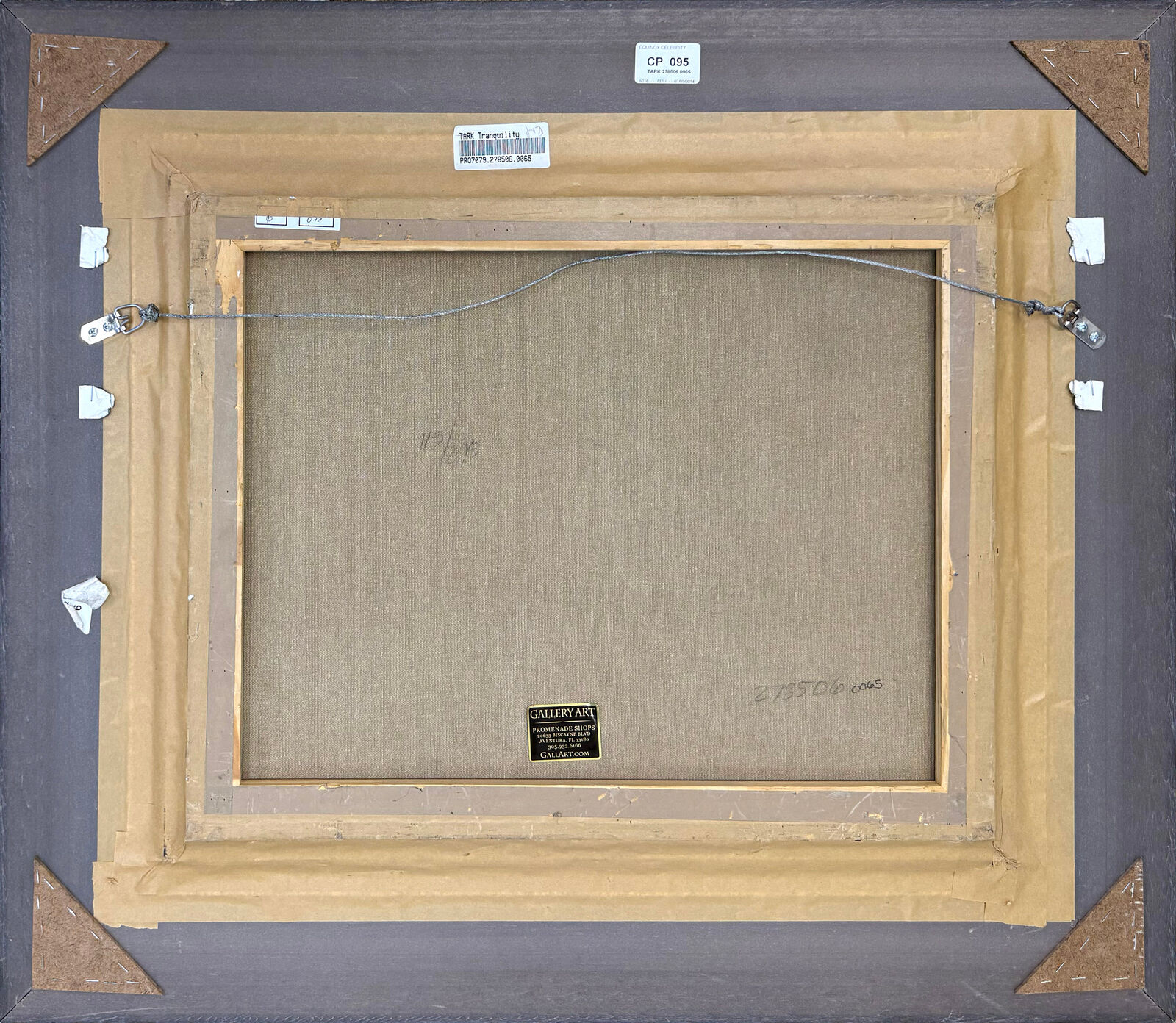 A painting of a woman sitting at a table with a vase of flowers.