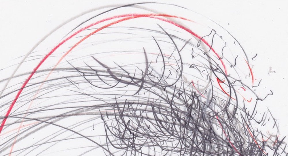 A drawing of a red and black line drawing on a white surface.