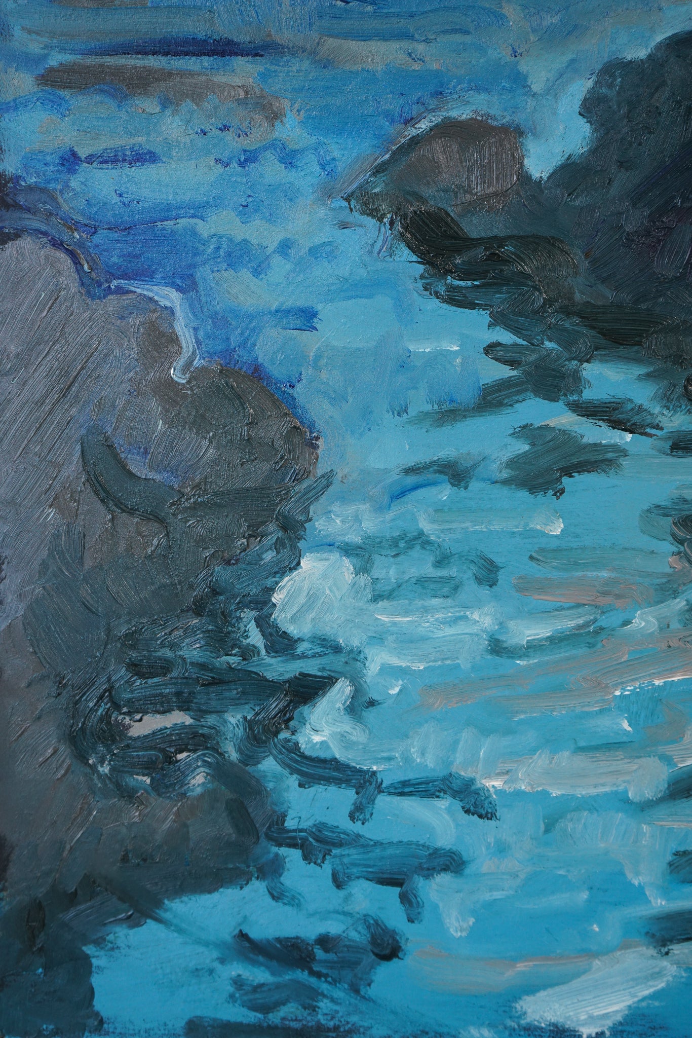 A painting of a rocky shoreline with waves crashing on the rocks.