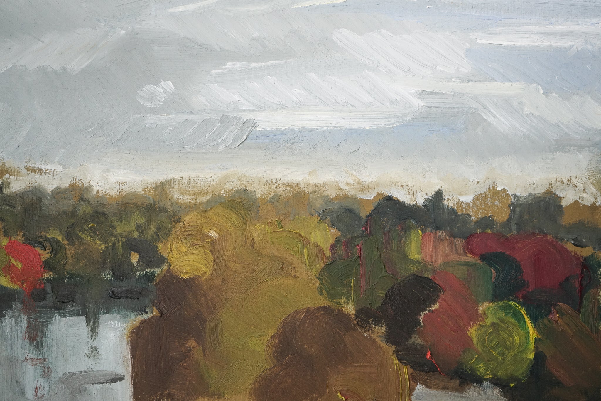 A painting of a landscape with trees and a river.