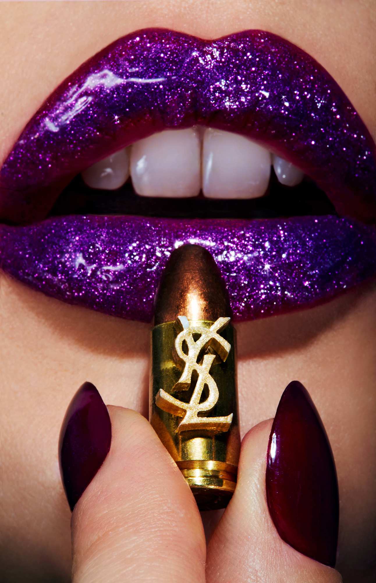 A close up of a woman's lips with a purple lipstick.