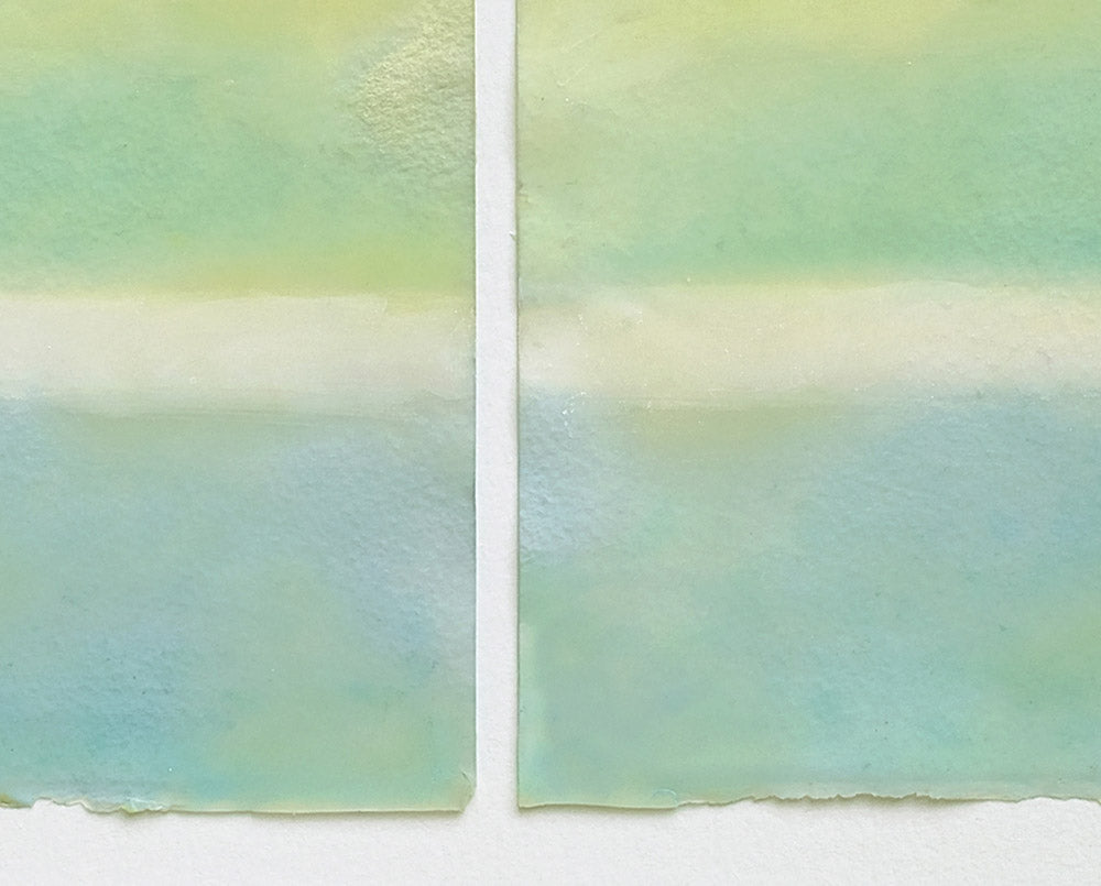 A painting of two squares of watercolor on a white background.