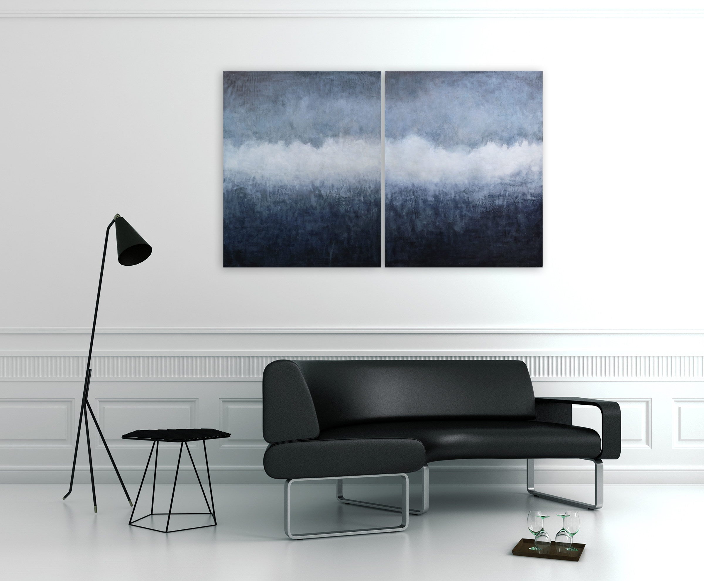 A pair of blue and white paintings on a white wall.