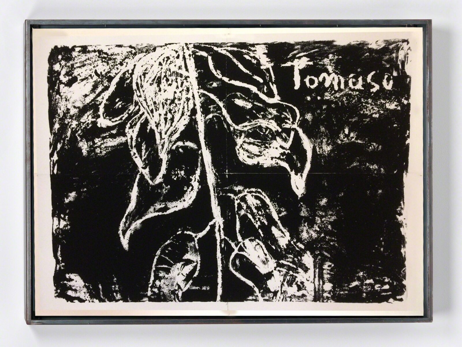 A black and white drawing of a plant on a wall.