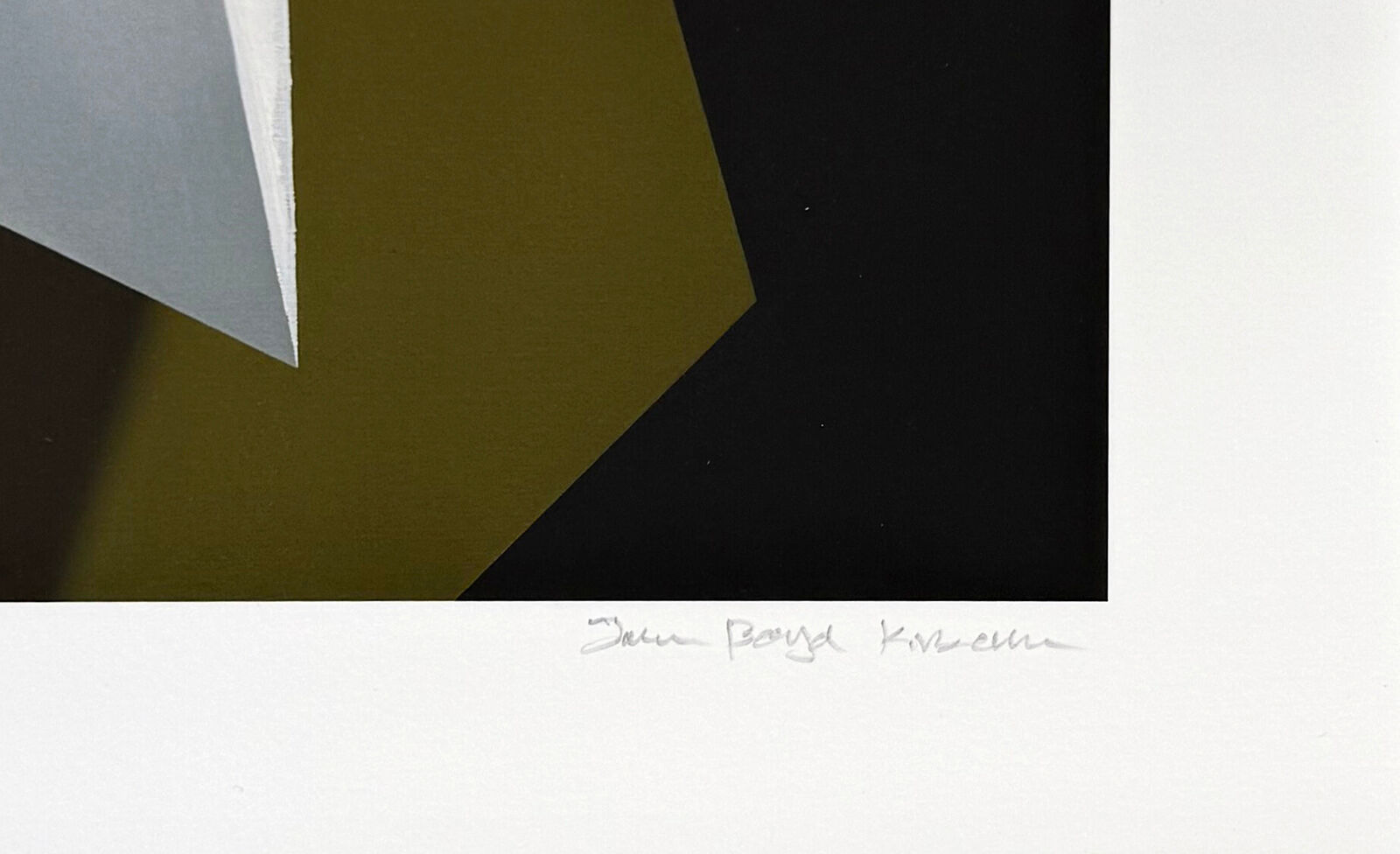 A picture of a colorful abstract painting in a white frame.