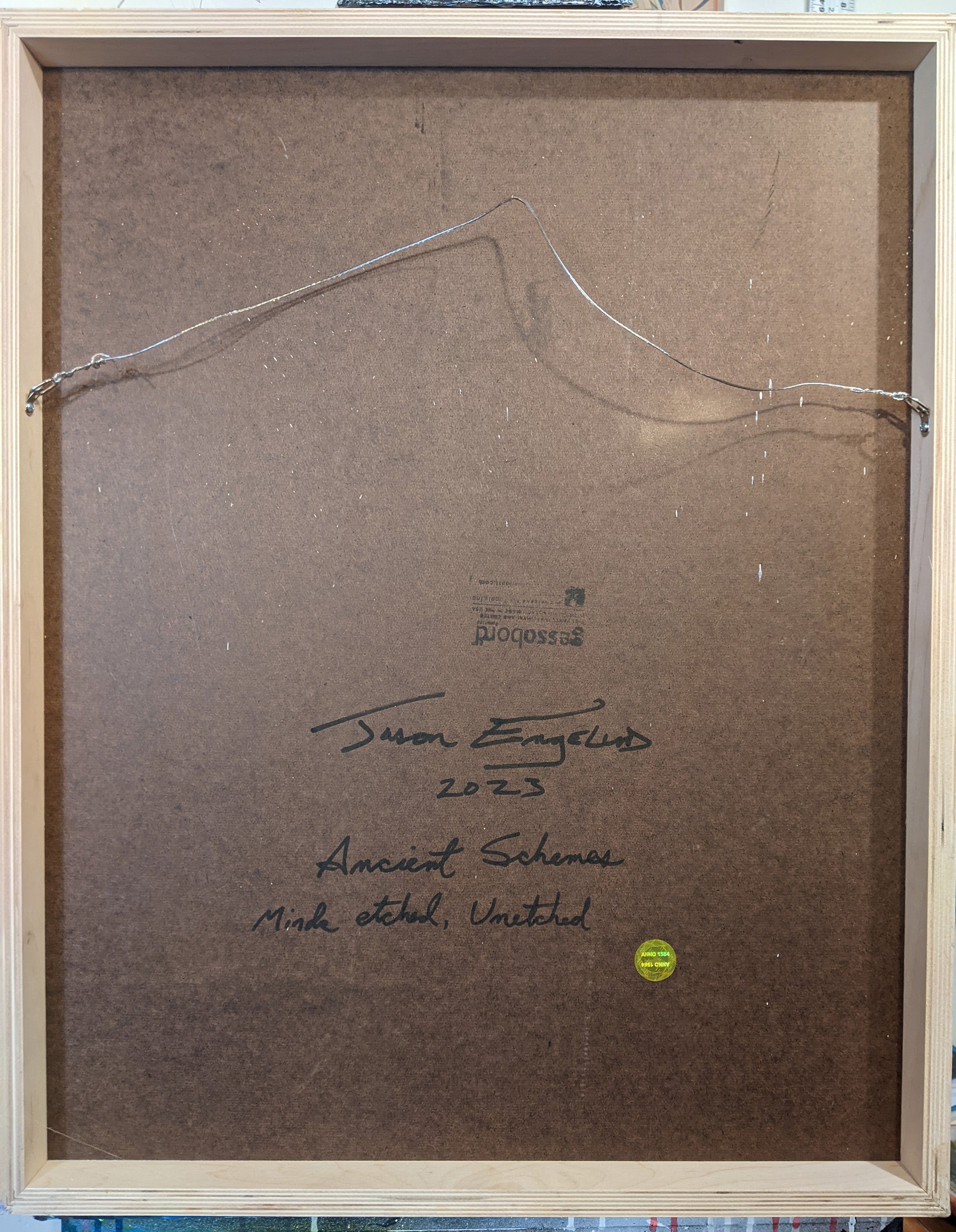 A collage of a road with a bird flying over it.