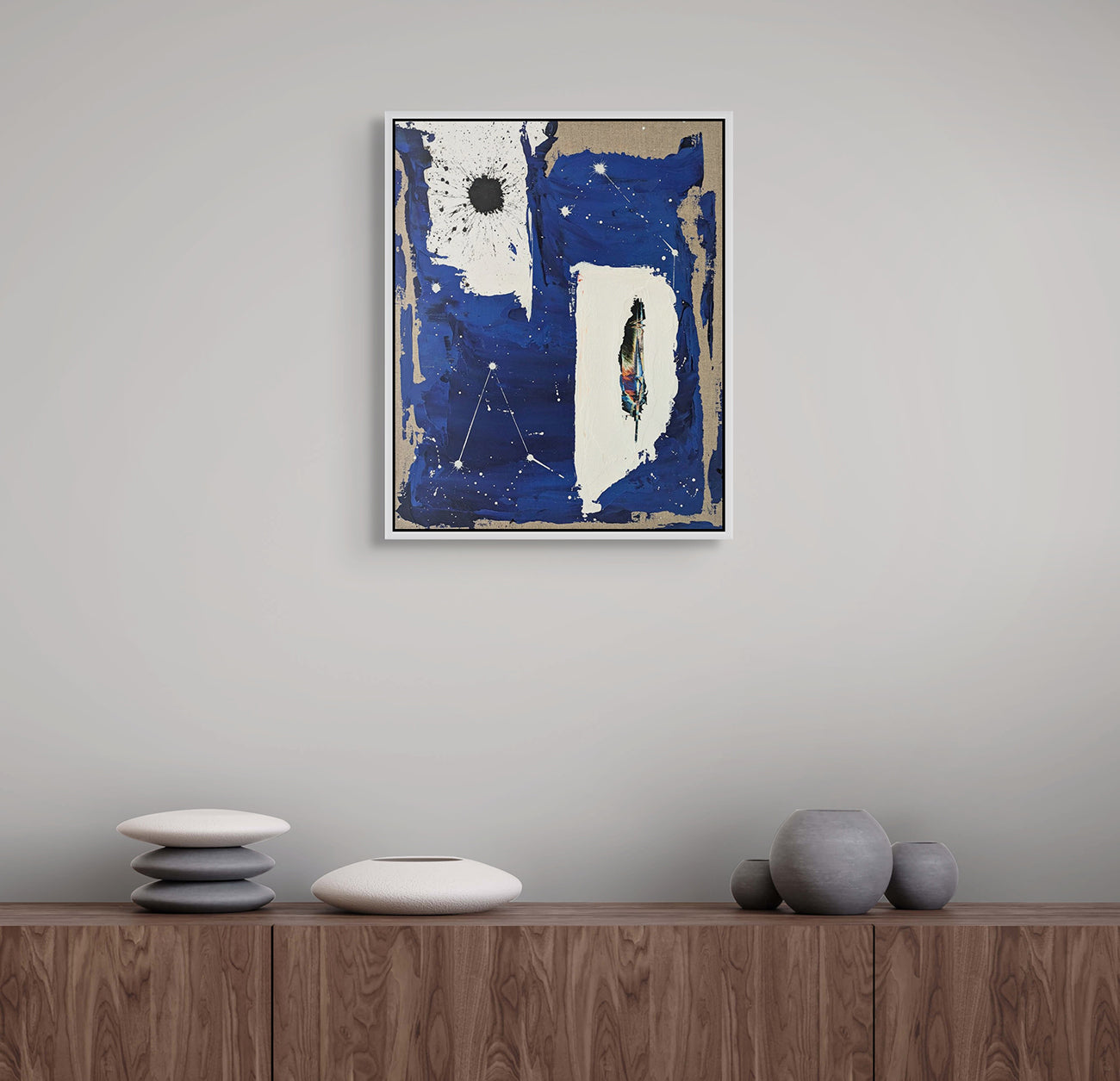 A painting of a blue and white abstract painting with a feather on it.