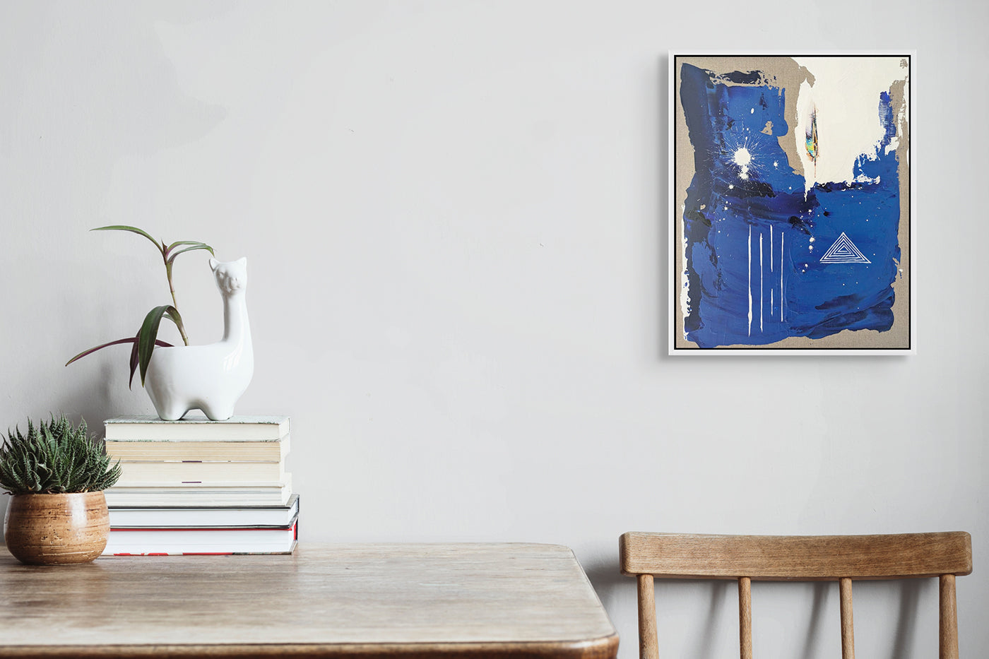 A painting of a blue and white abstract painting with a triangle on it.