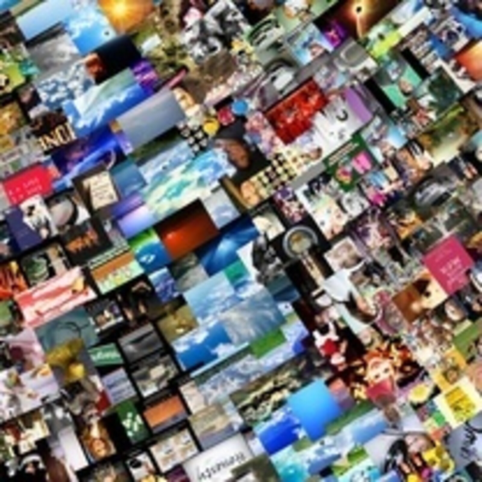 A gallery installation featuring two large framed collages of tiny images flanked by small digital displays.