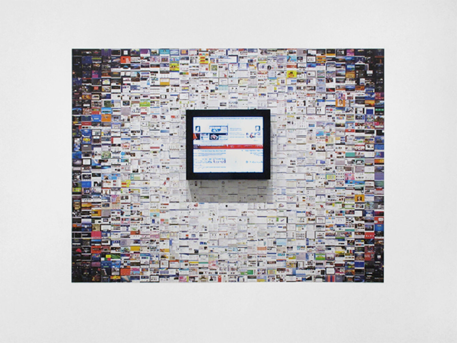A framed colorful mosaic hangs against a wall made of thousands of tiny, varied images.