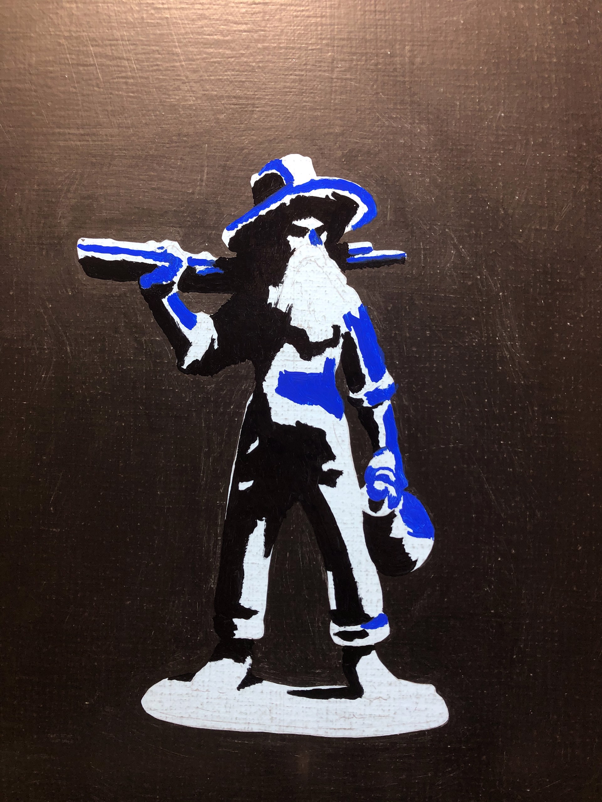 A glowing blue statue of a figure with a hat and long beard, holding a staff and a lantern.