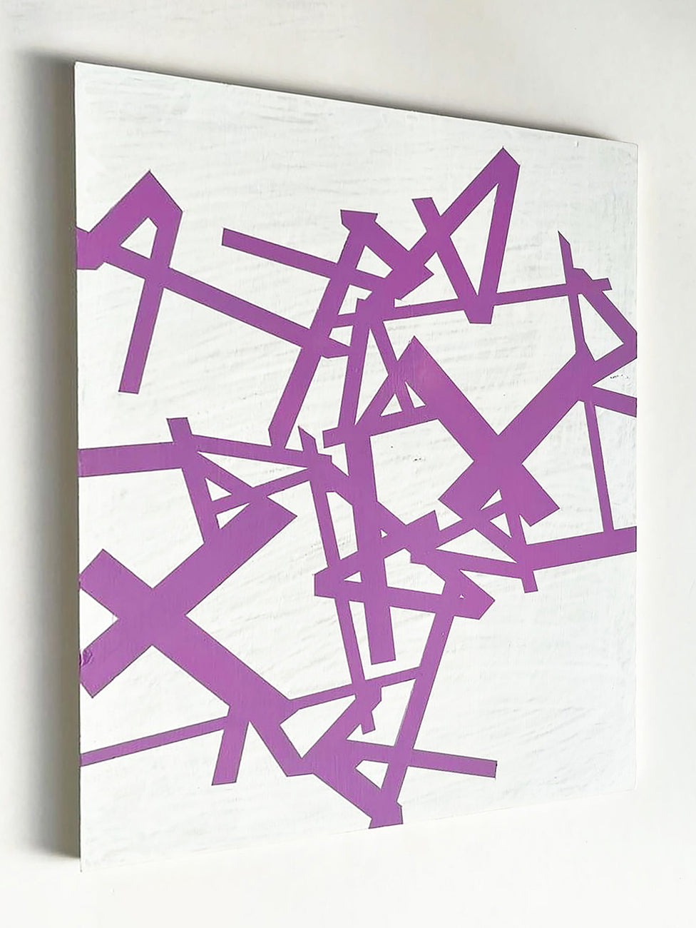 A painting of purple and white geometric shapes on a white background.