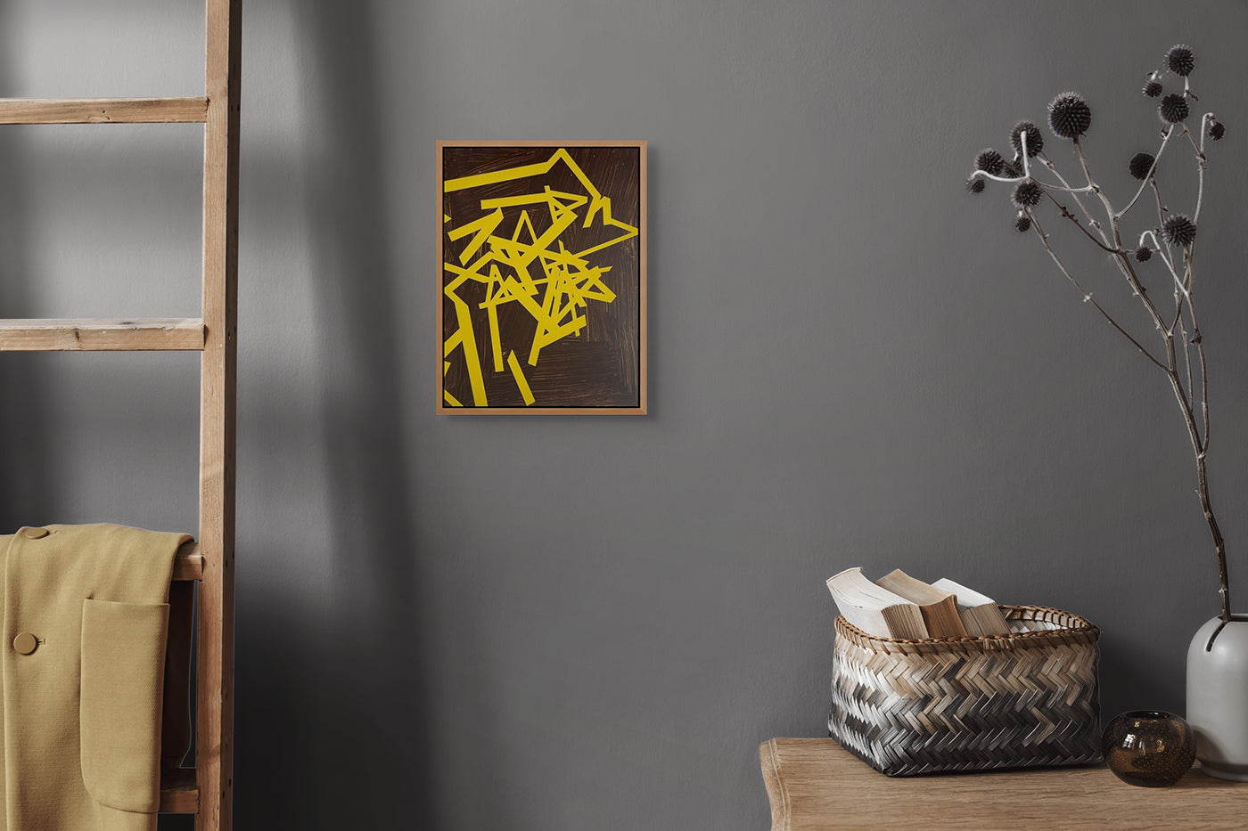 A painting of yellow and brown shapes on a brown background.