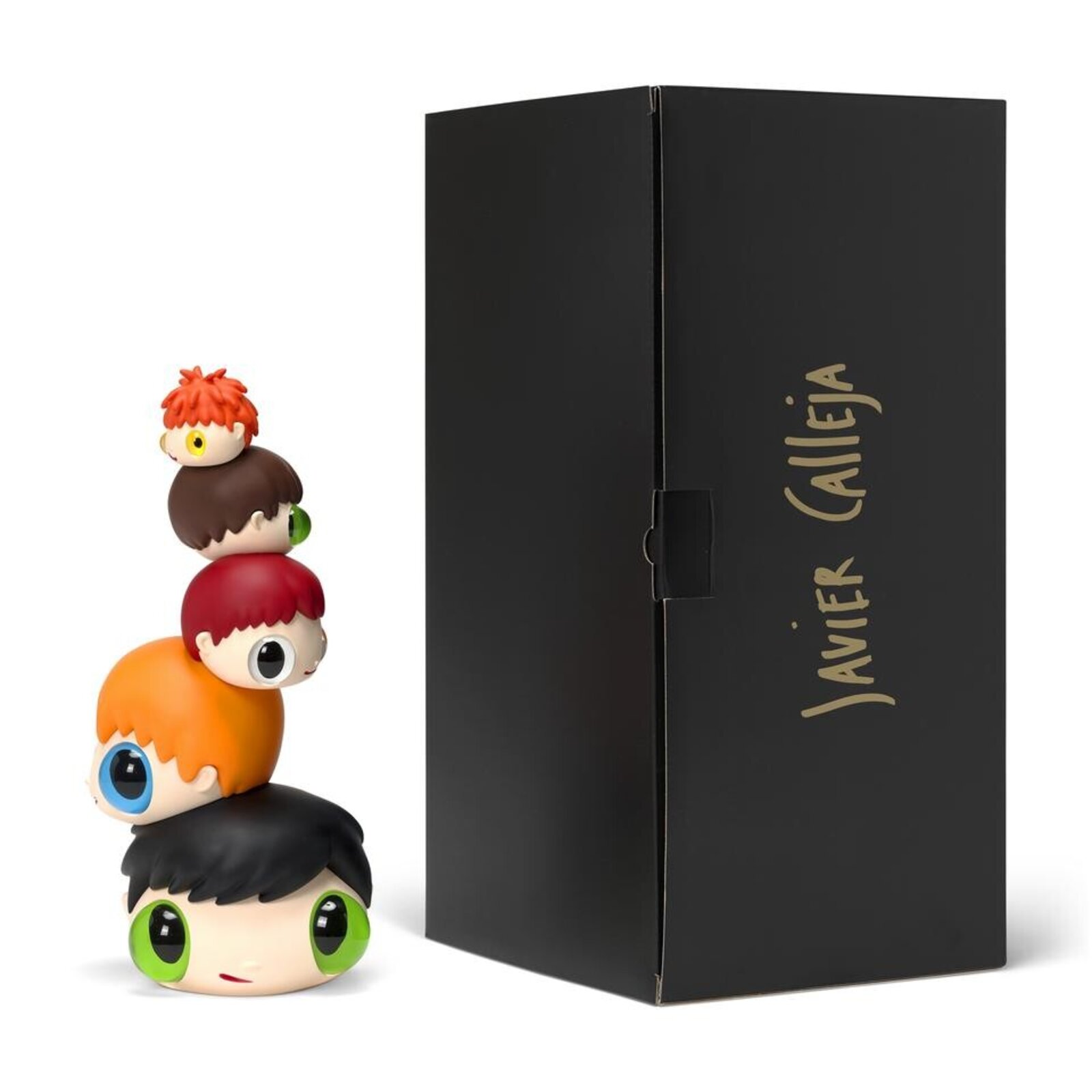 A whimsical stack of colorful, oversized heads with mismatched eyes sits beside a tall black box.