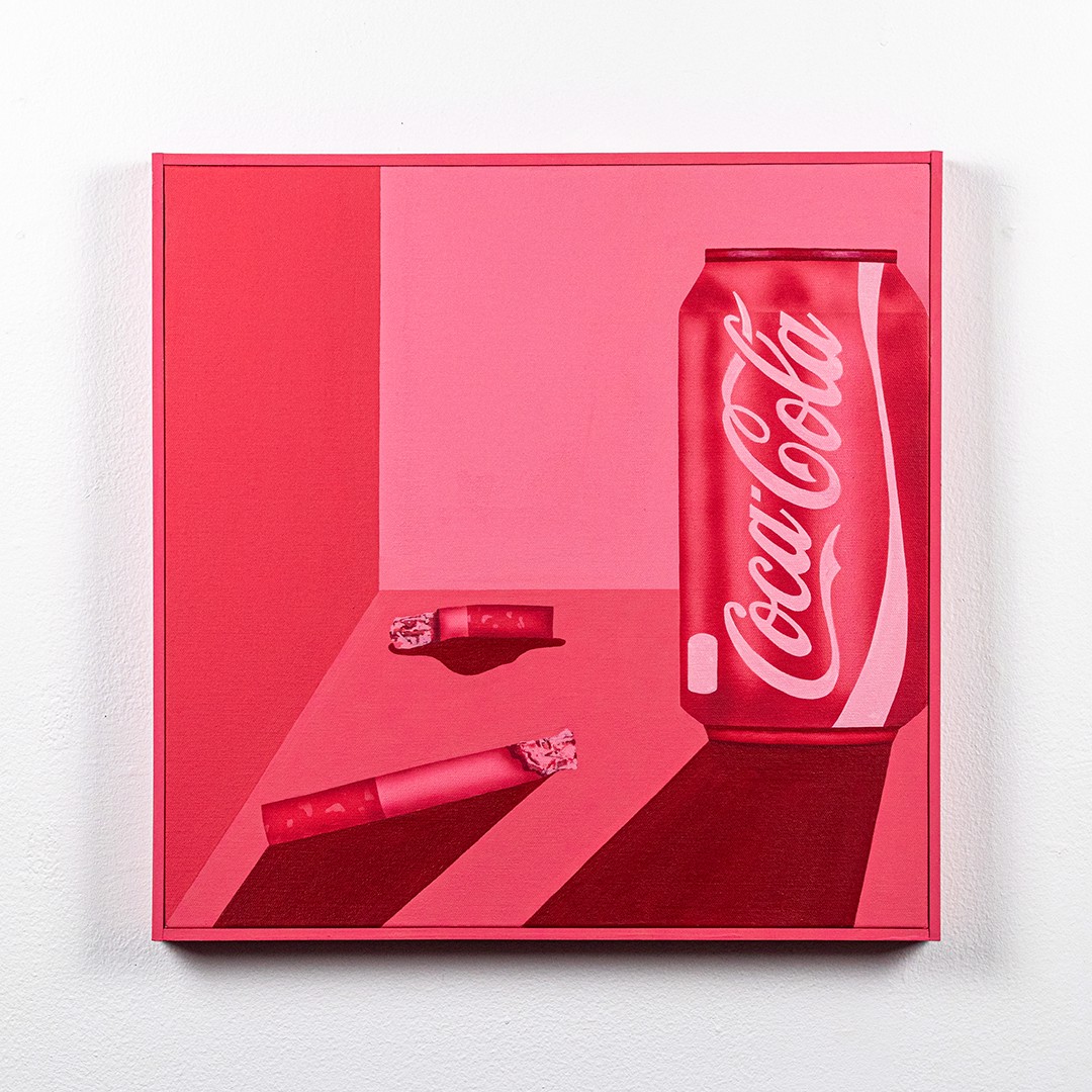 A coca cola can and a cigarette on a pink background.