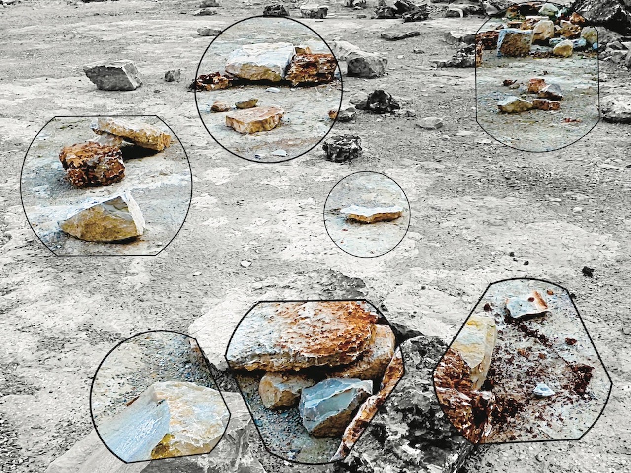 A bunch of rocks that are sitting on the ground.