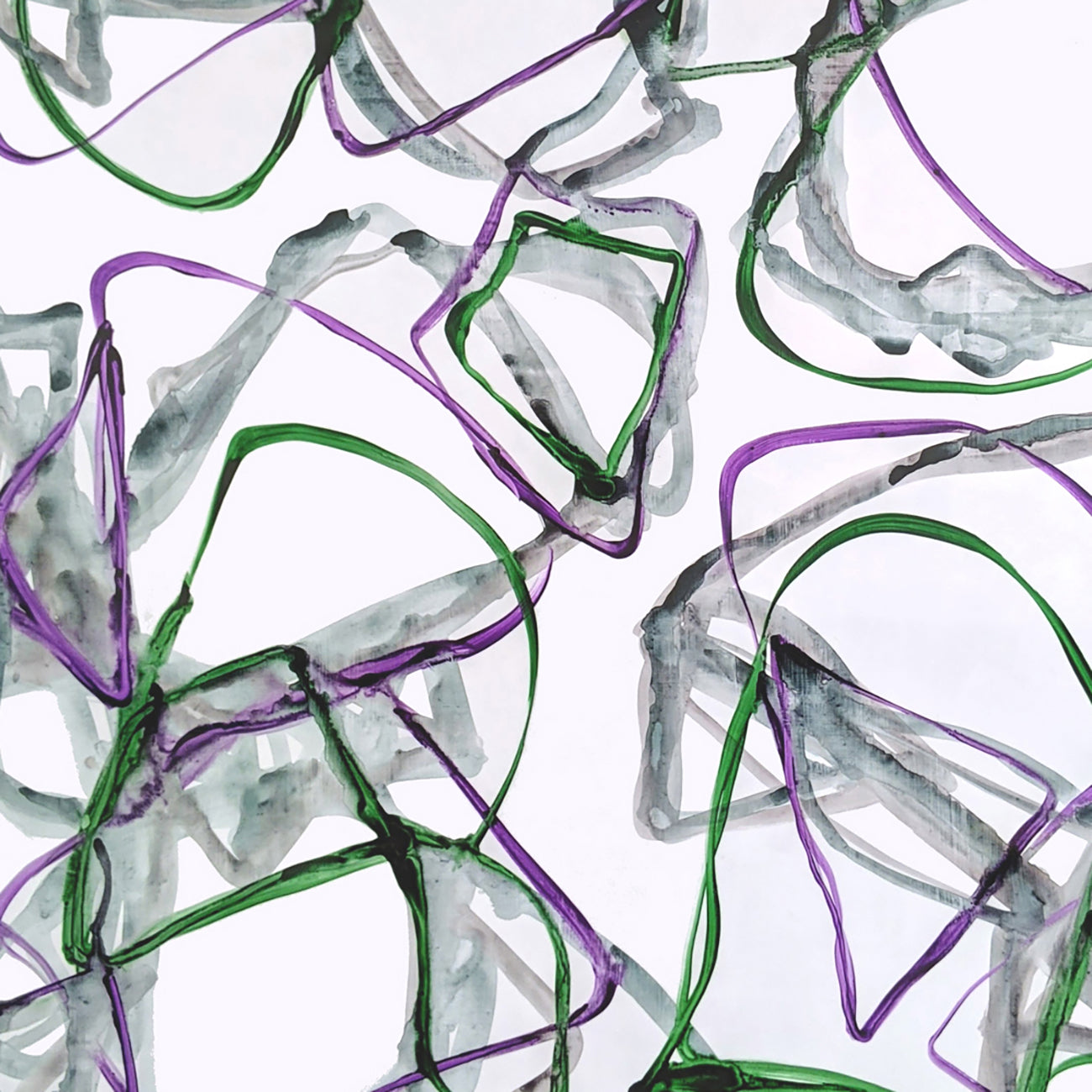 A drawing of purple and green shapes on a white background.