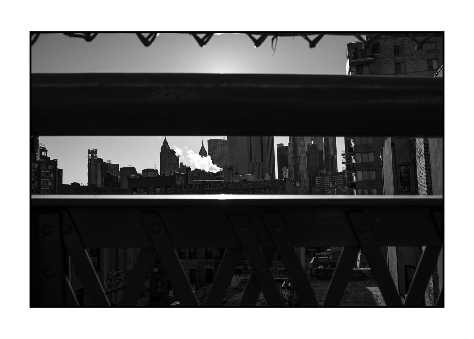 A black and white photo of a city skyline.