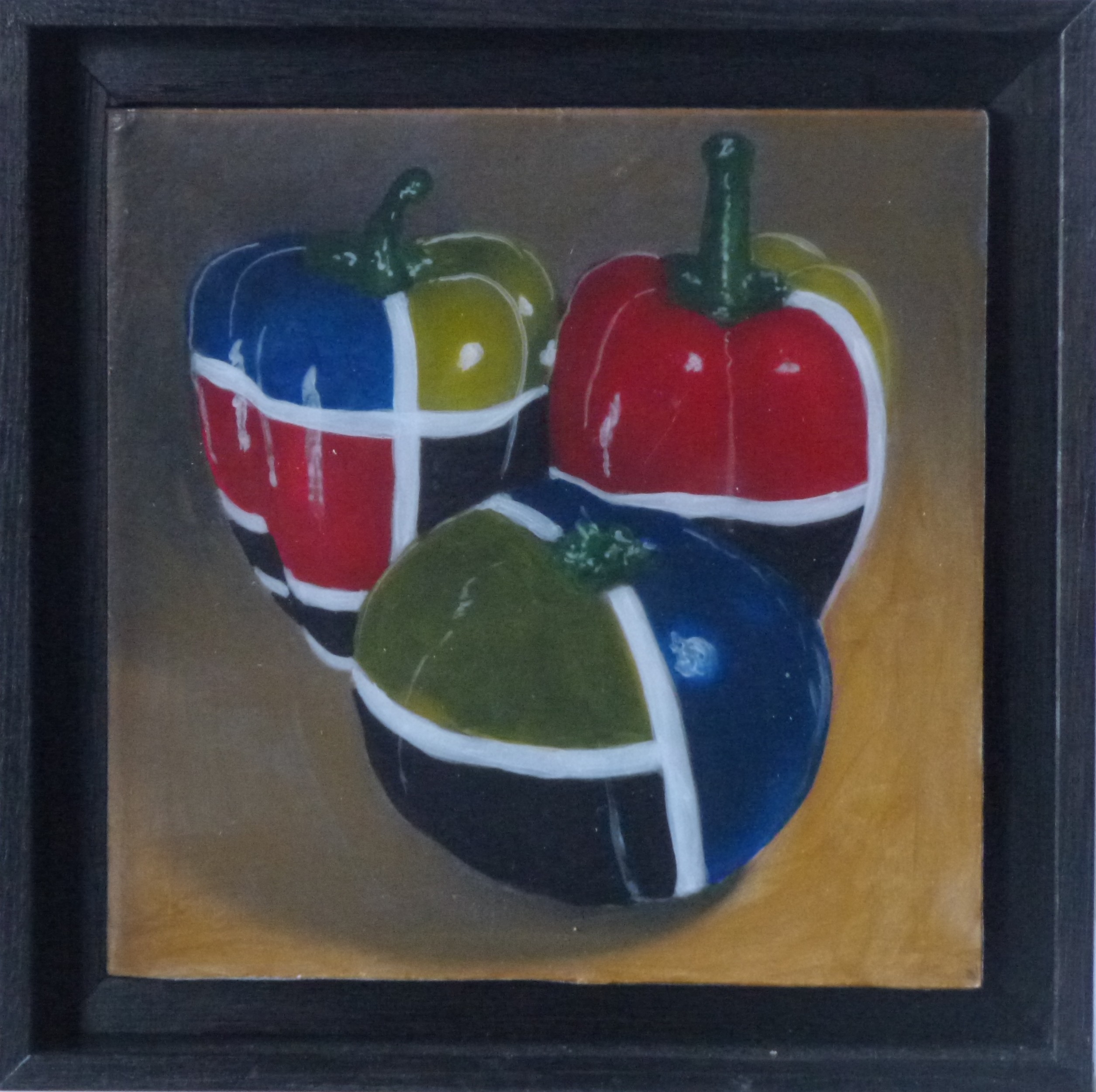 A painting of three colorful peppers in a black frame.