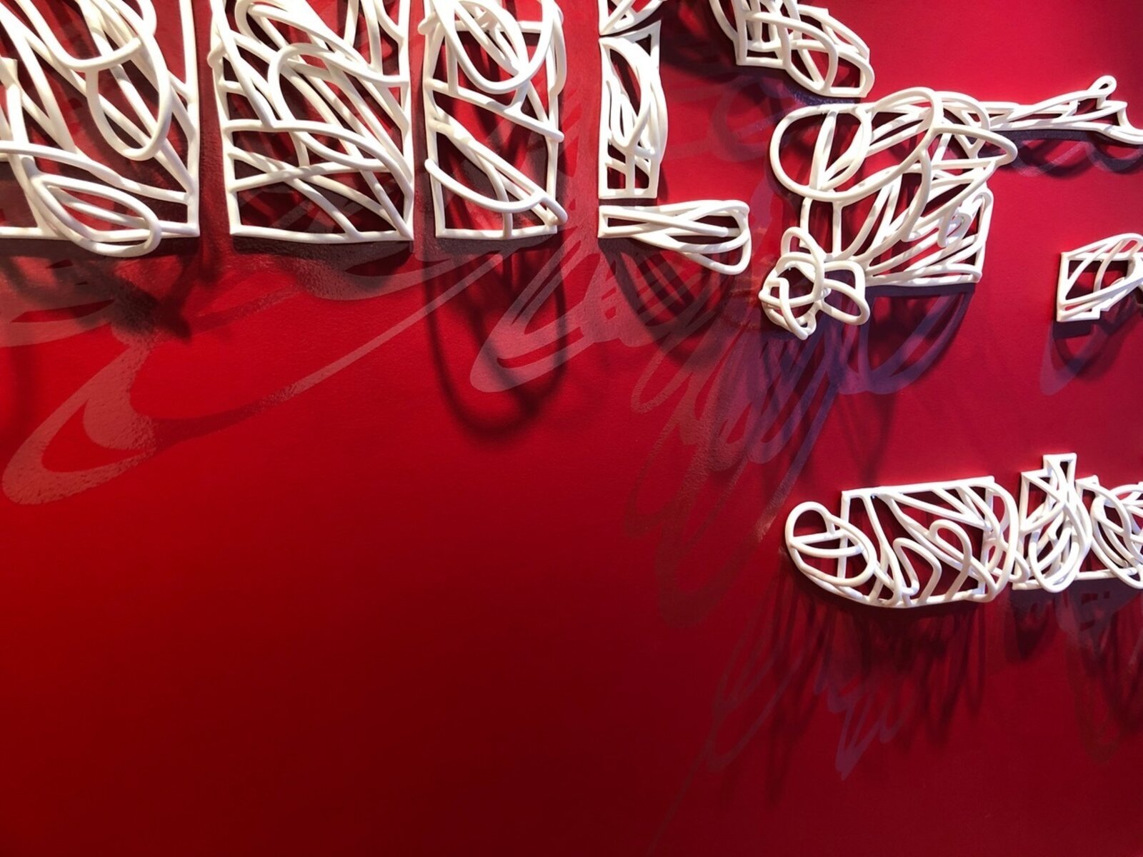 Artwork by Jeanne Quinn, Dust And A Shadow, Made of Porcelain, underglaze, vinyl, paint 