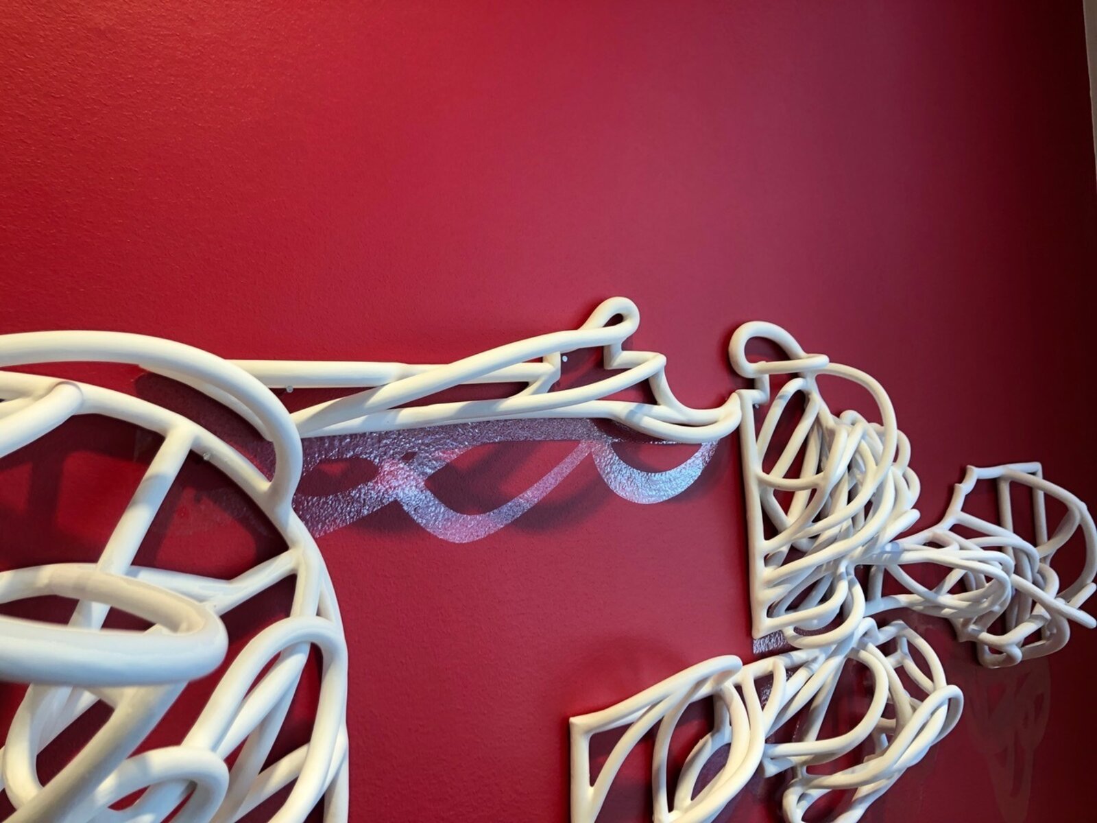 Artwork by Jeanne Quinn, Dust And A Shadow, Made of Porcelain, underglaze, vinyl, paint 