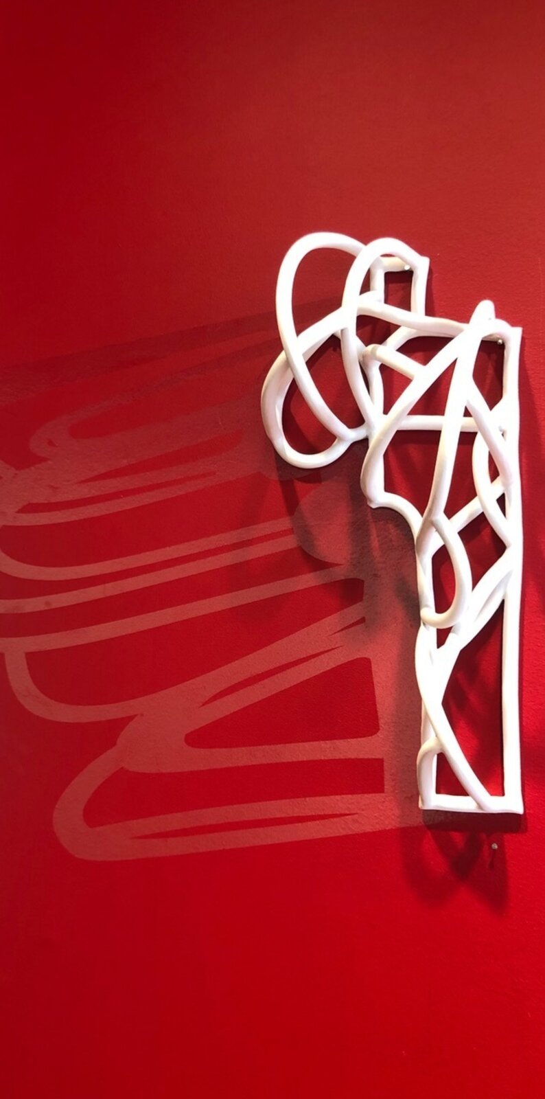 Artwork by Jeanne Quinn, Dust And A Shadow, Made of Porcelain, underglaze, vinyl, paint 