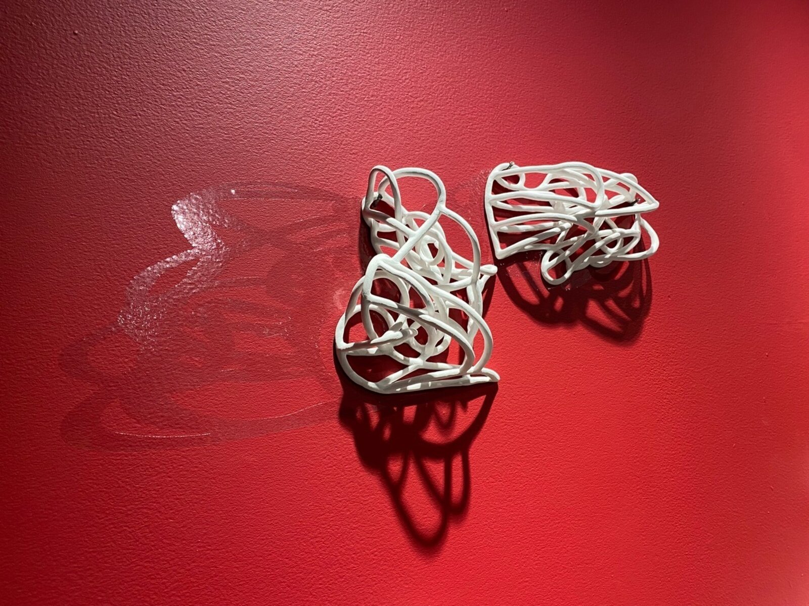 Artwork by Jeanne Quinn, Dust And A Shadow II, Made of Porcelain, underglaze, vinyl, paint 