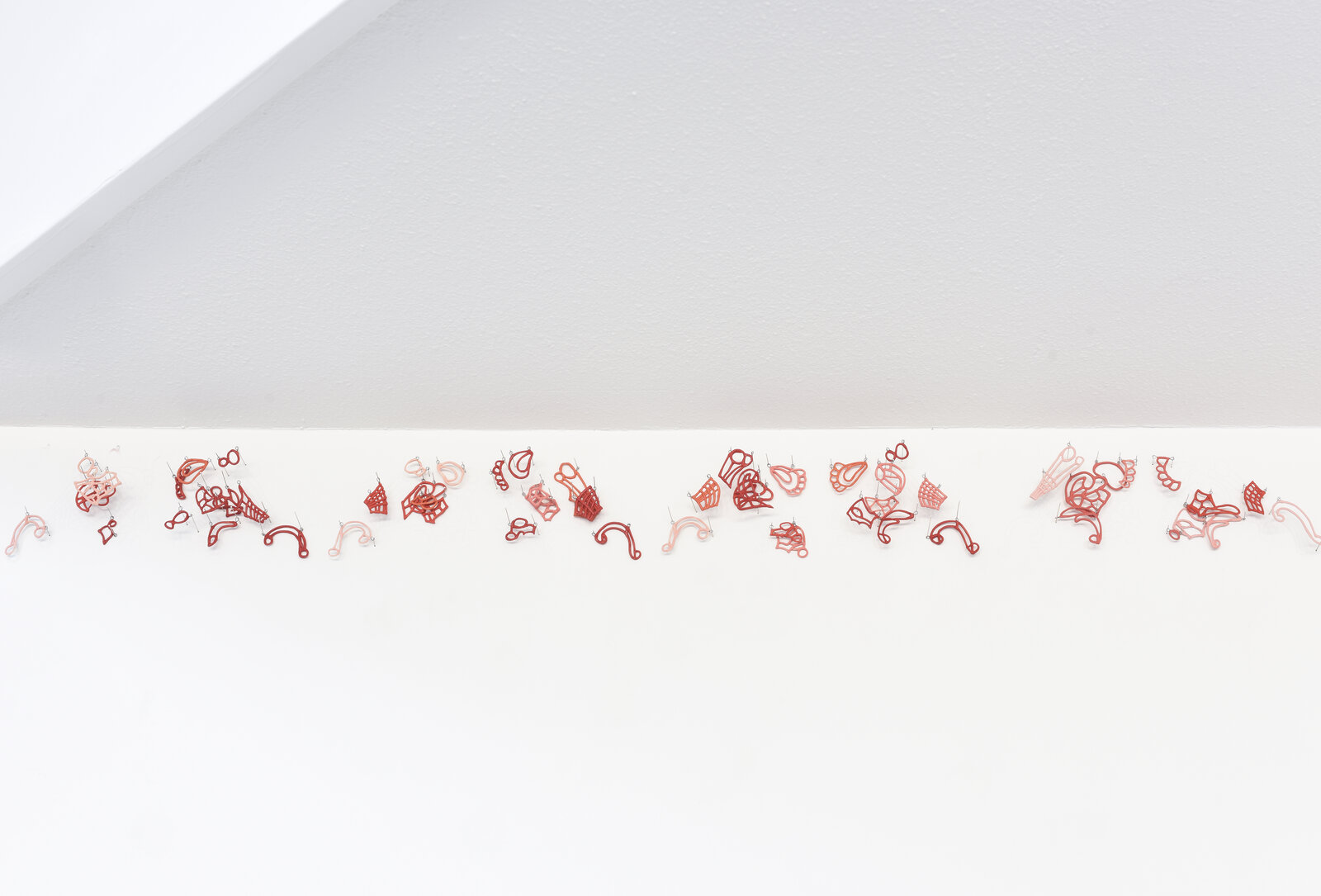 Artwork by Jeanne Quinn, The Fragile Border ( Pink and Red Porcelain Lace), Made of Porcelain, underglaze , pins, vinyl 