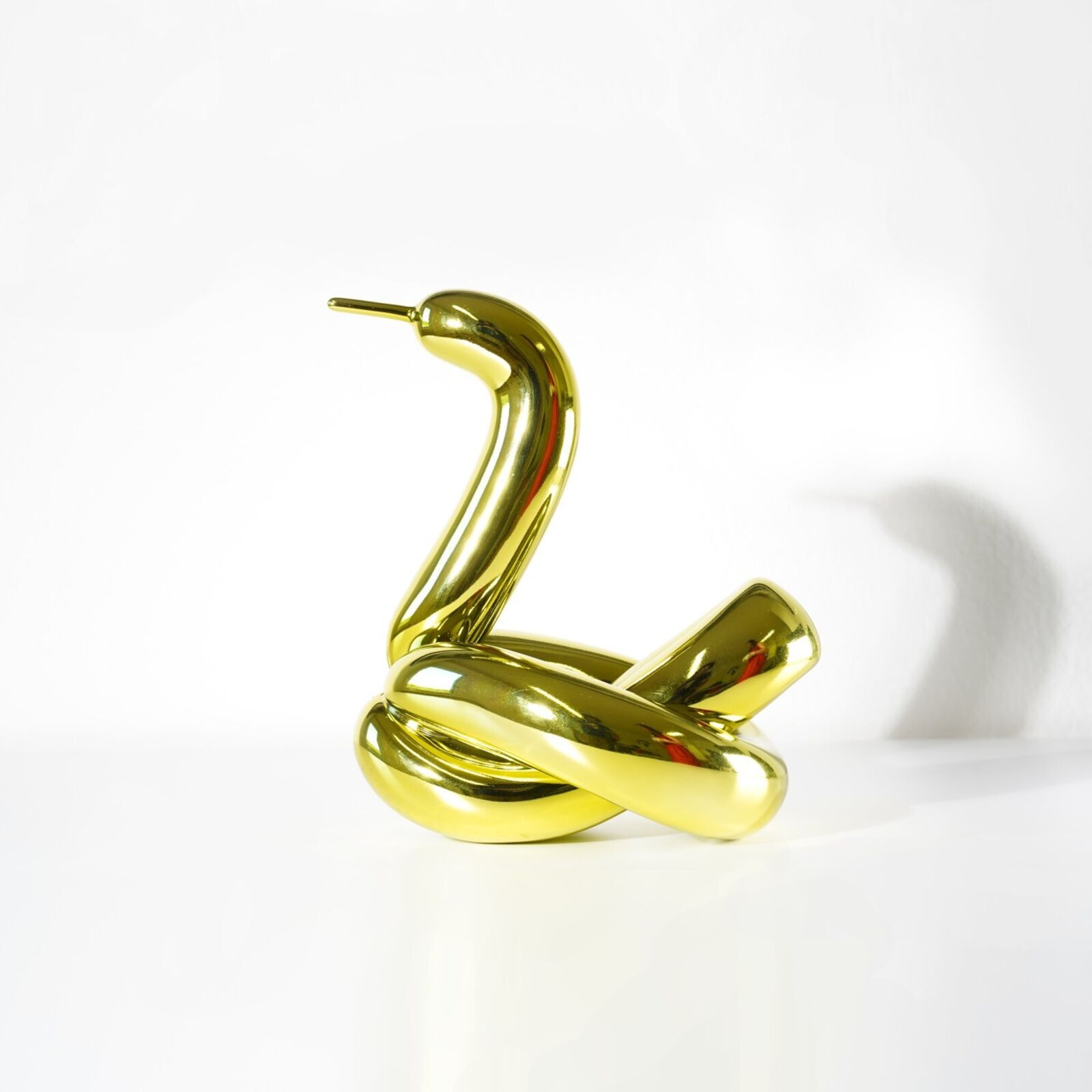 Artwork by Jeff Koons, Balloon Swan (Yellow), Made of French Limoges porcelain with chromatic coating 