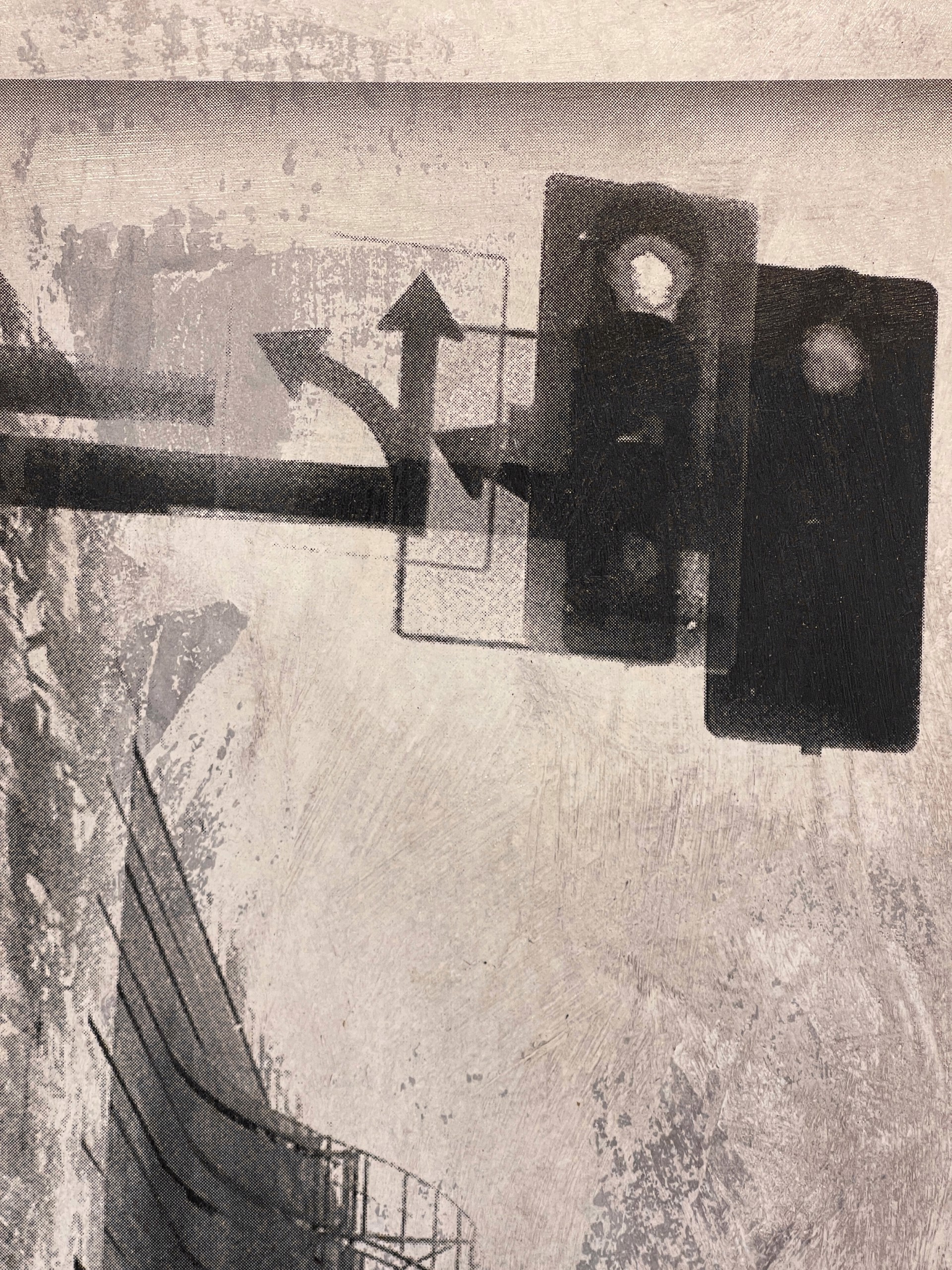 A black and white photo of a city street.