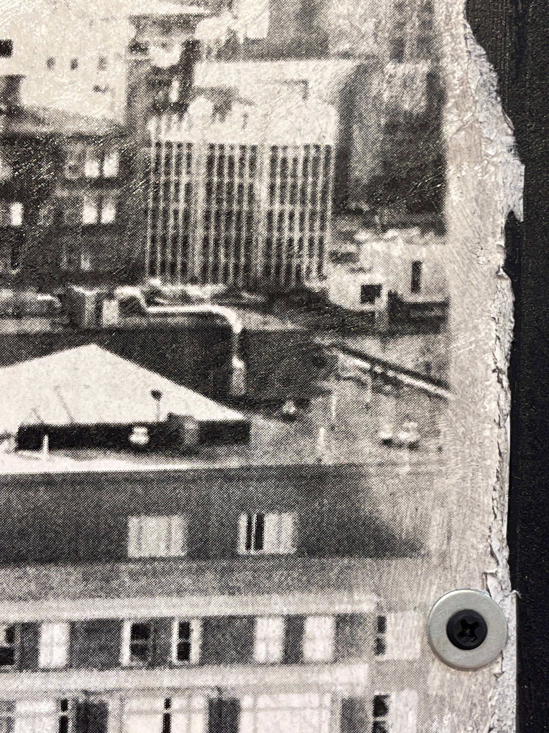 A black and white photo of a cityscape.