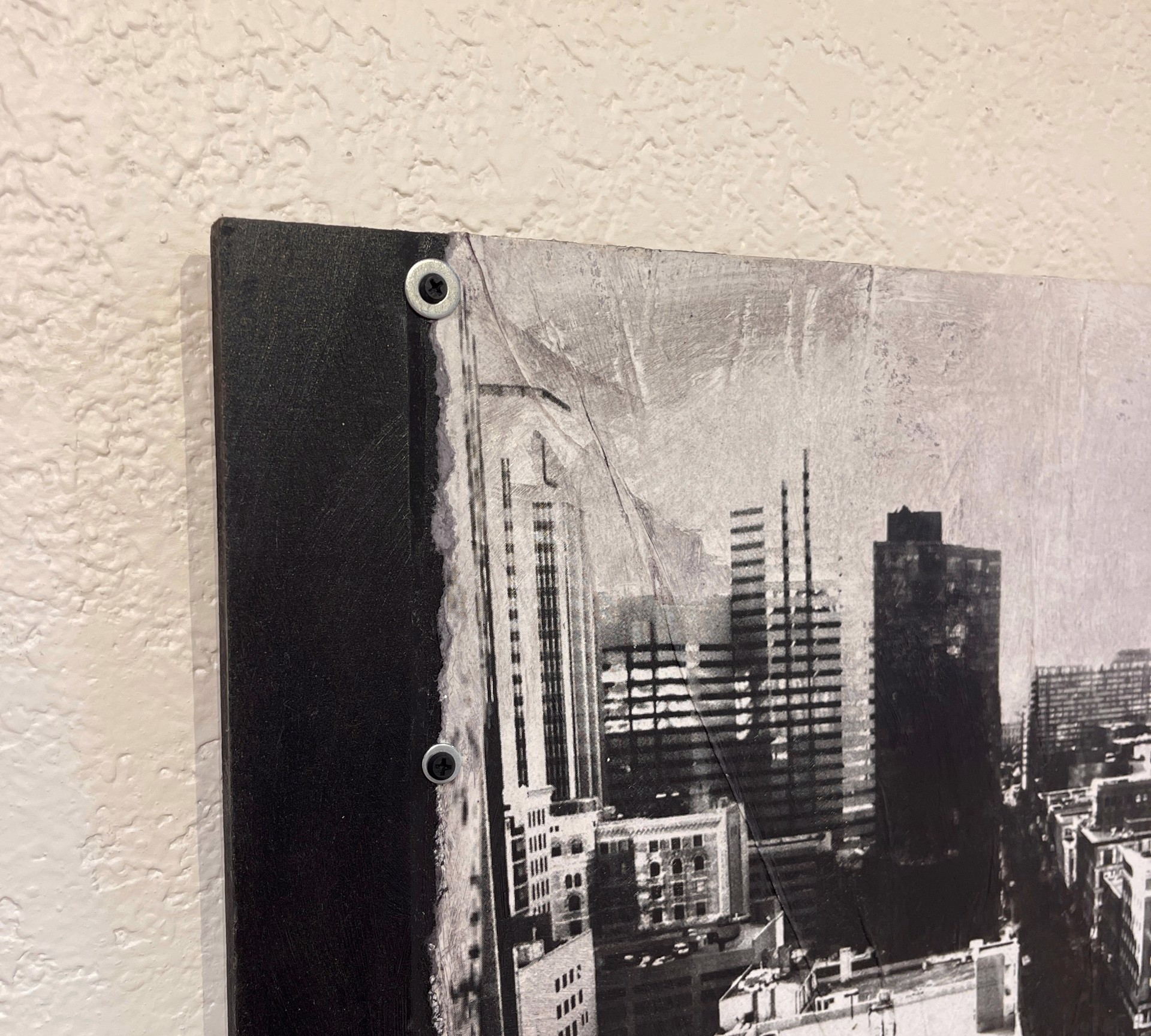 A black and white photo of a cityscape.