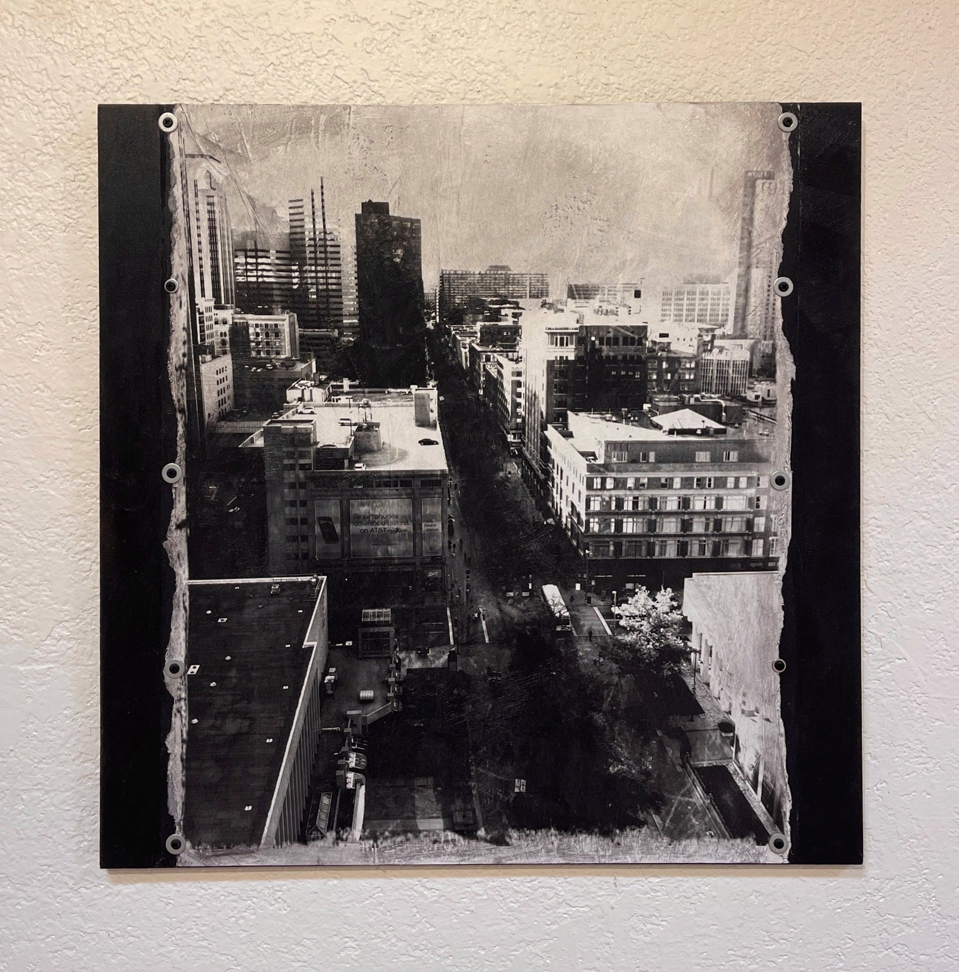 A black and white photo of a cityscape.