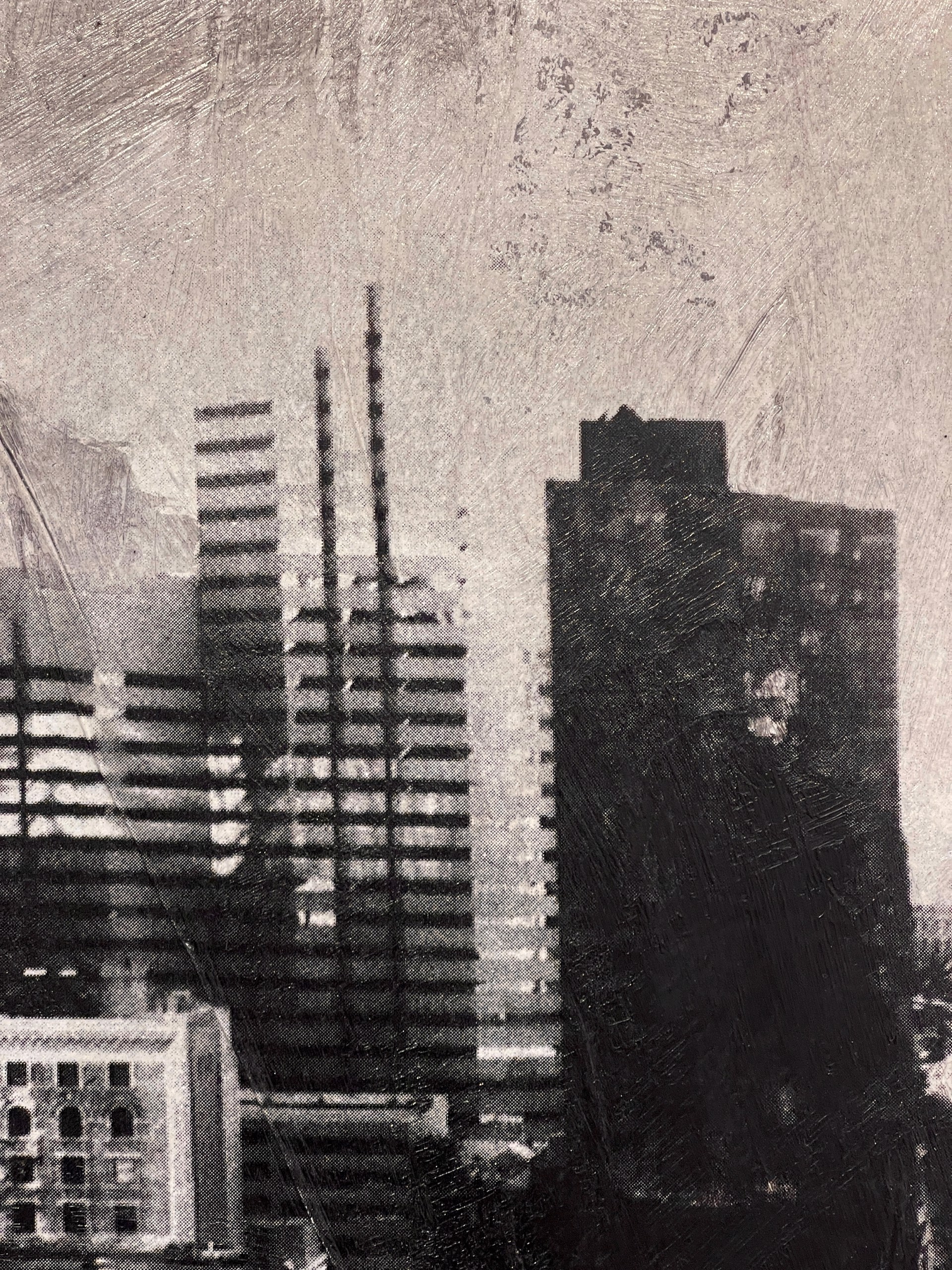 A black and white photo of a cityscape.