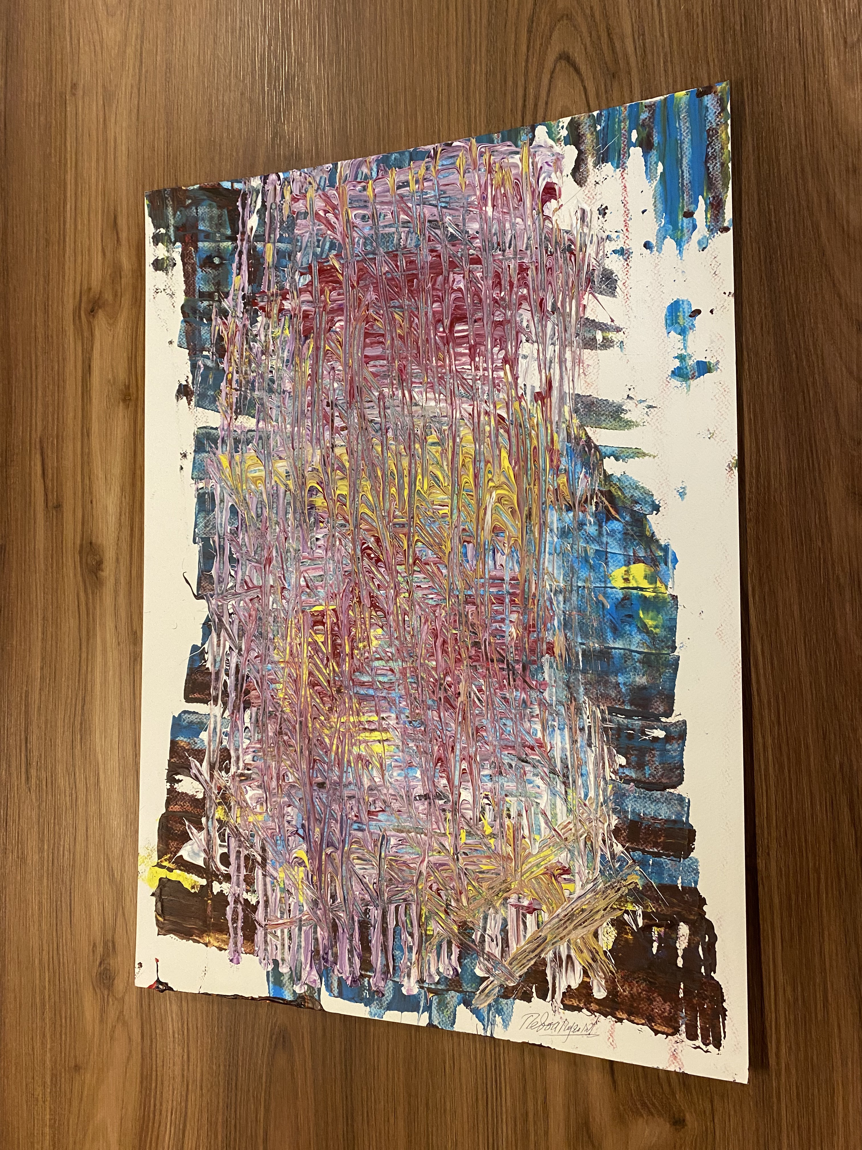 A painting on a wooden surface with a brown background.