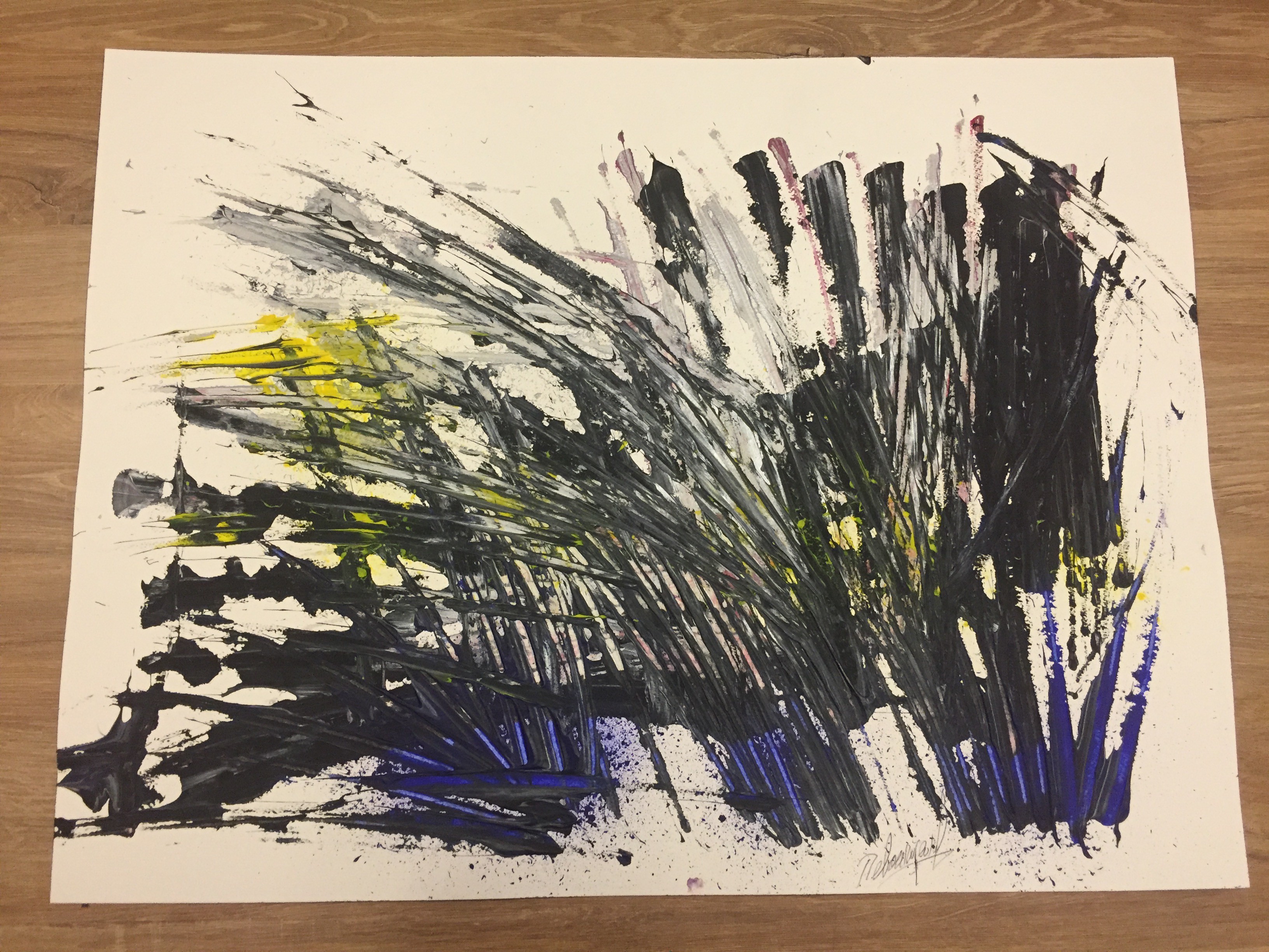 A painting on a wooden surface with black and yellow paint.