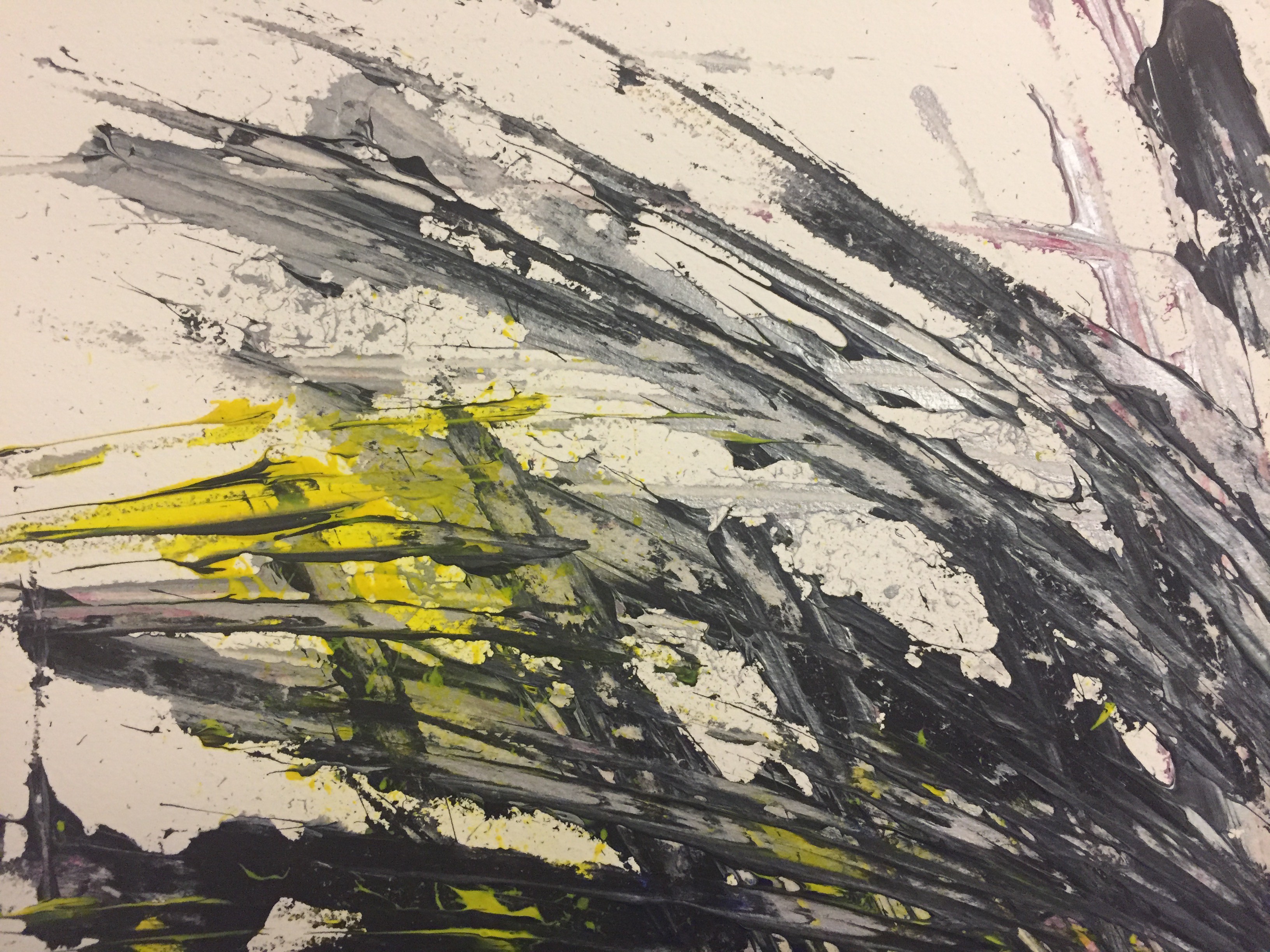 A painting on a wooden surface with black and yellow paint.
