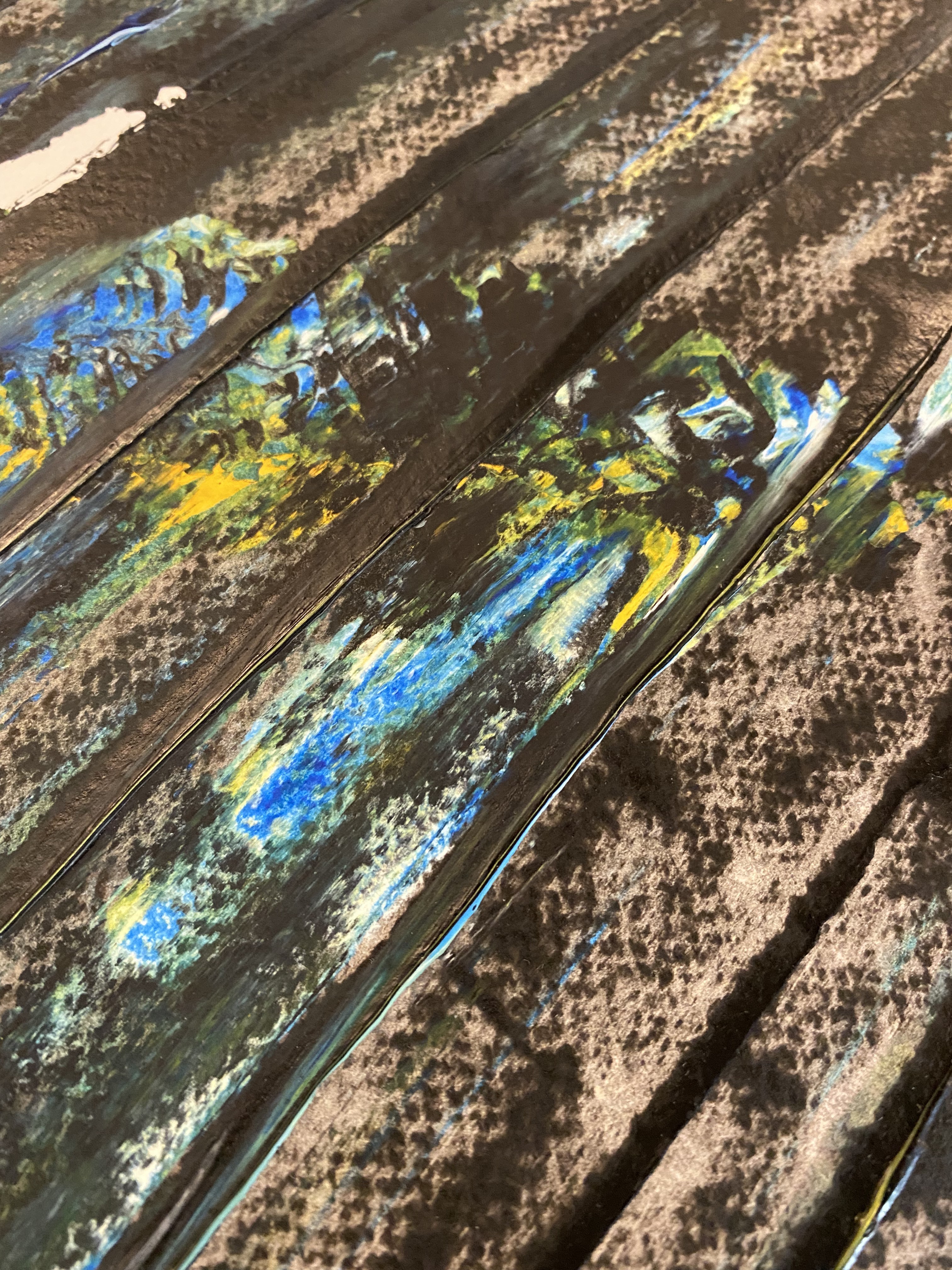 A painting on a wooden surface with a white background.