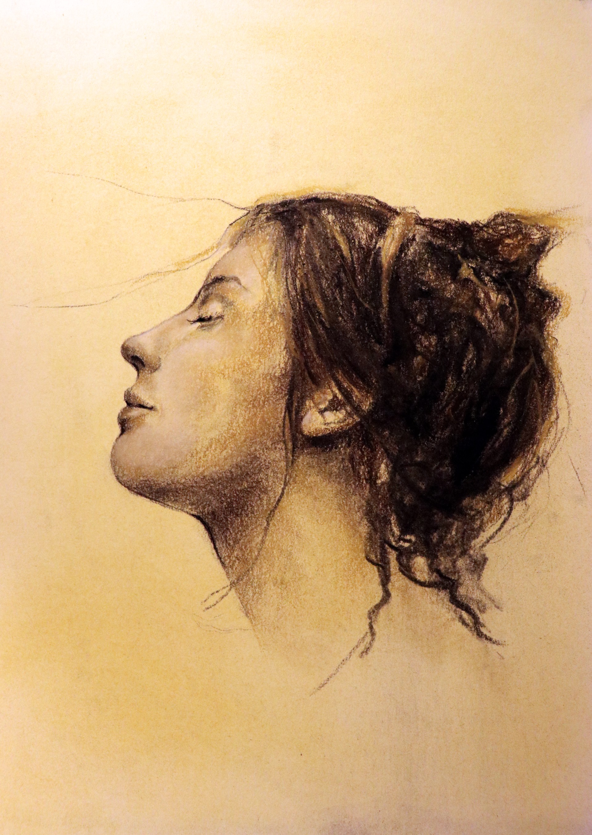 A drawing of a woman's head with her eyes closed.