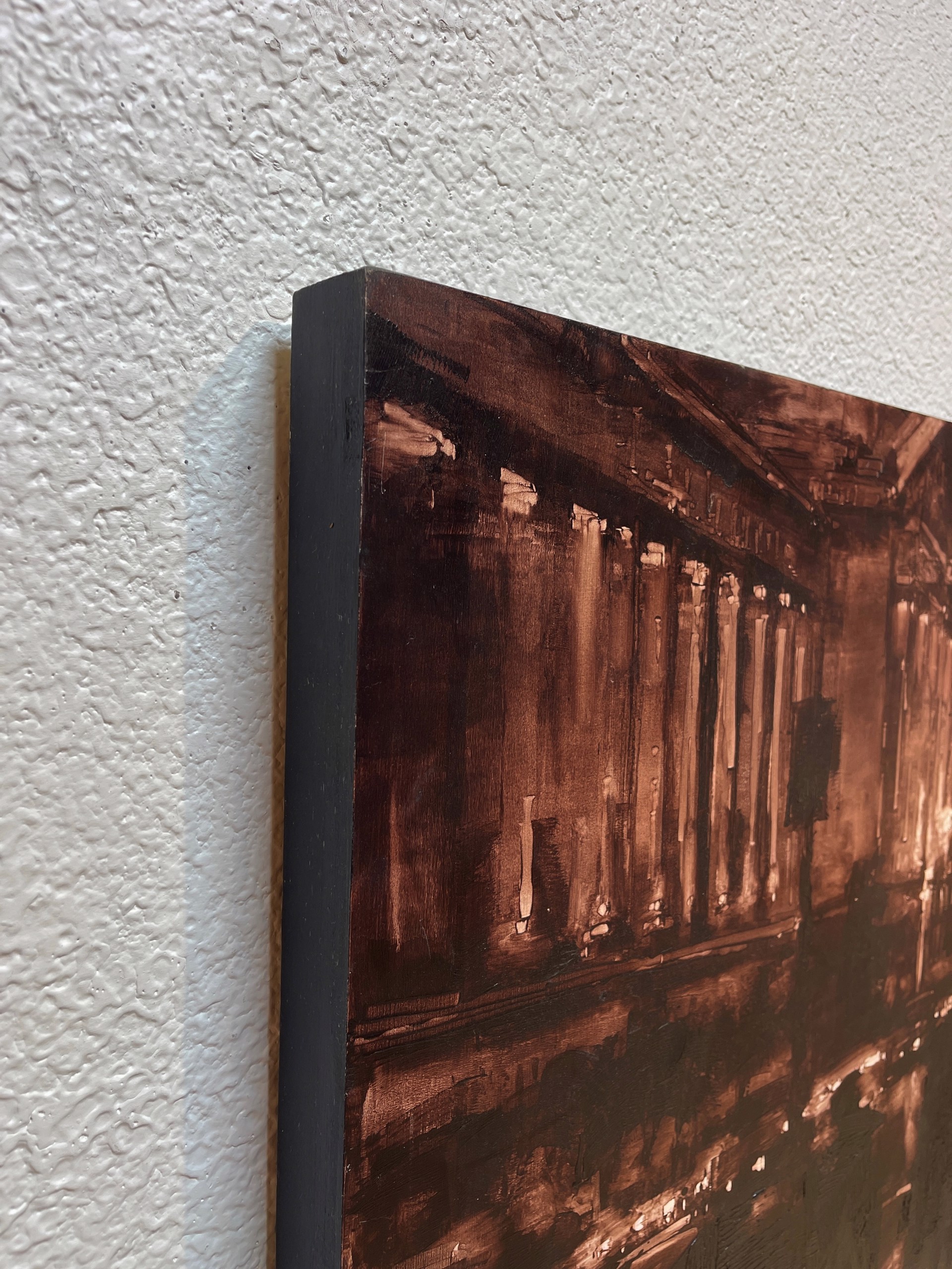 A painting of people walking down a city street at night.