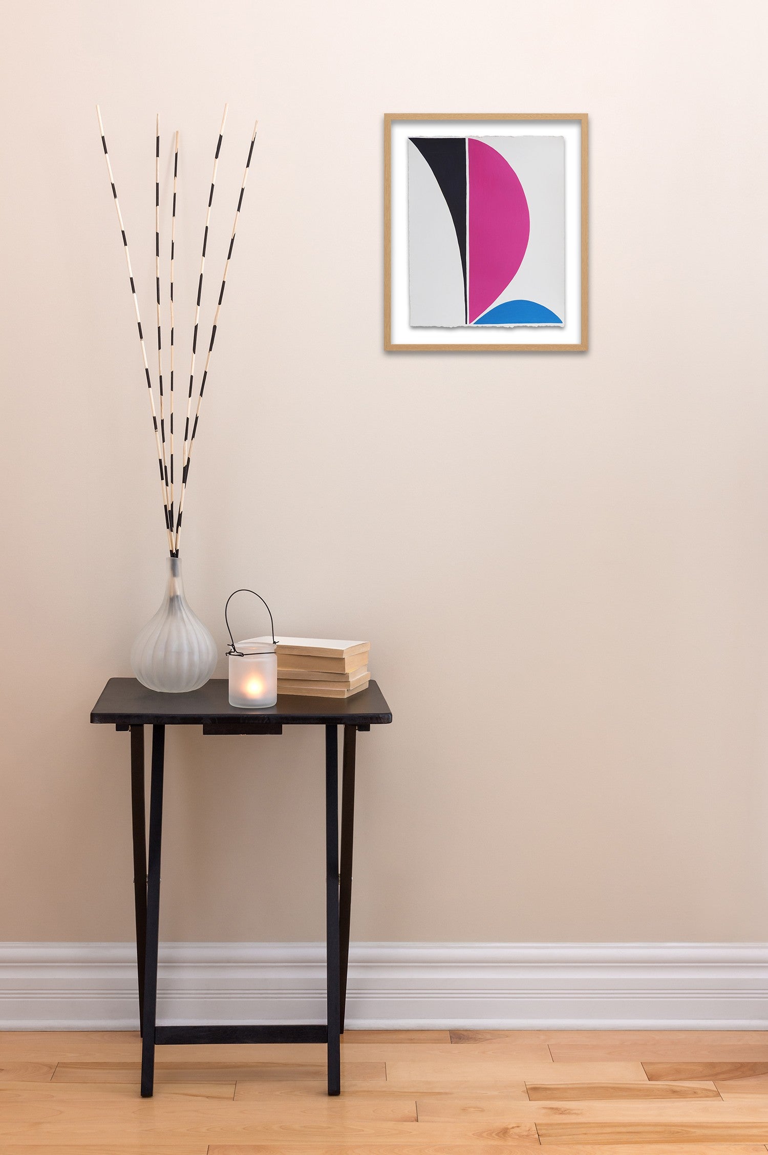 A piece of paper with a pink, black, and blue design on it.