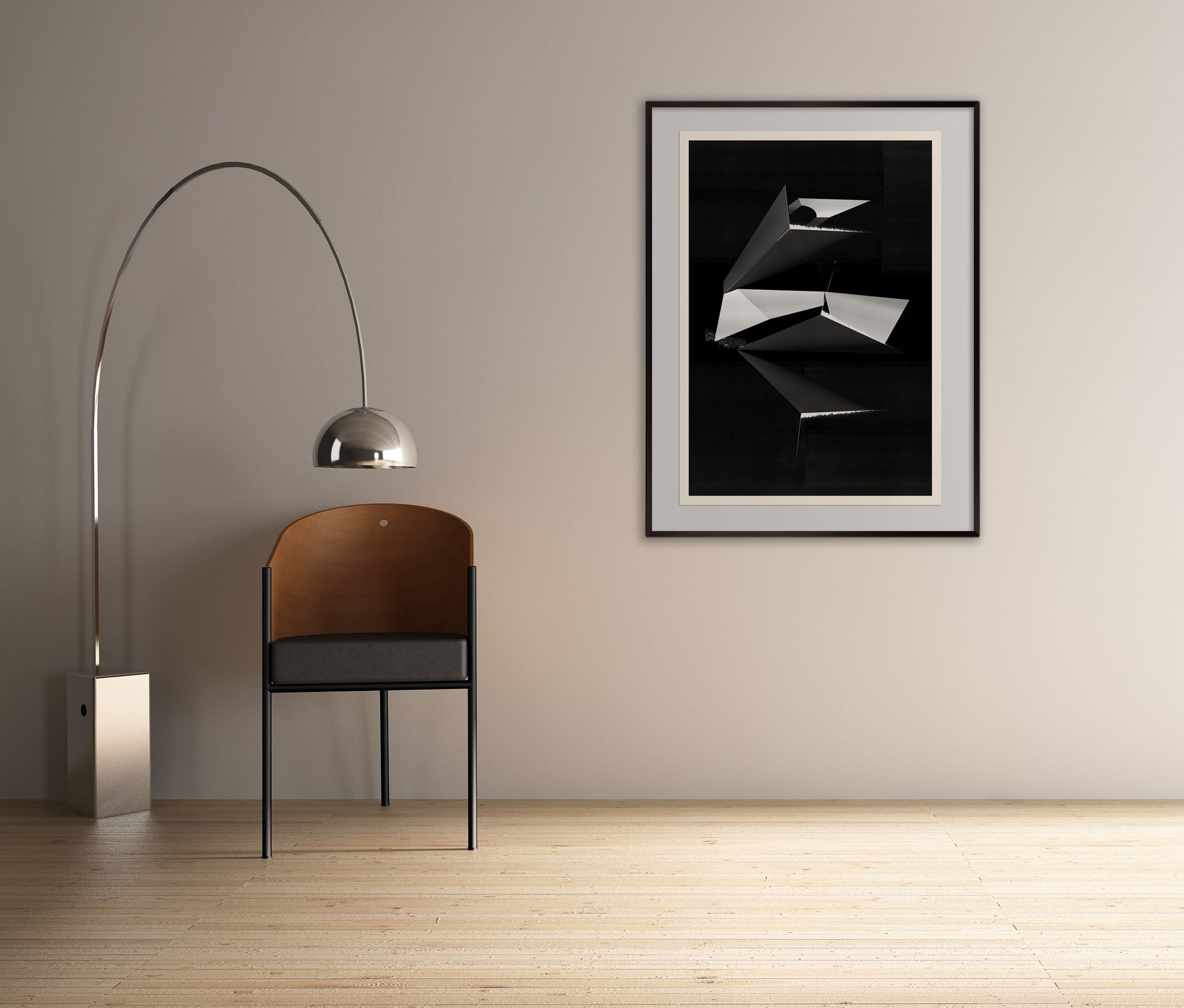 A black and white photo of a black and silver abstract painting.