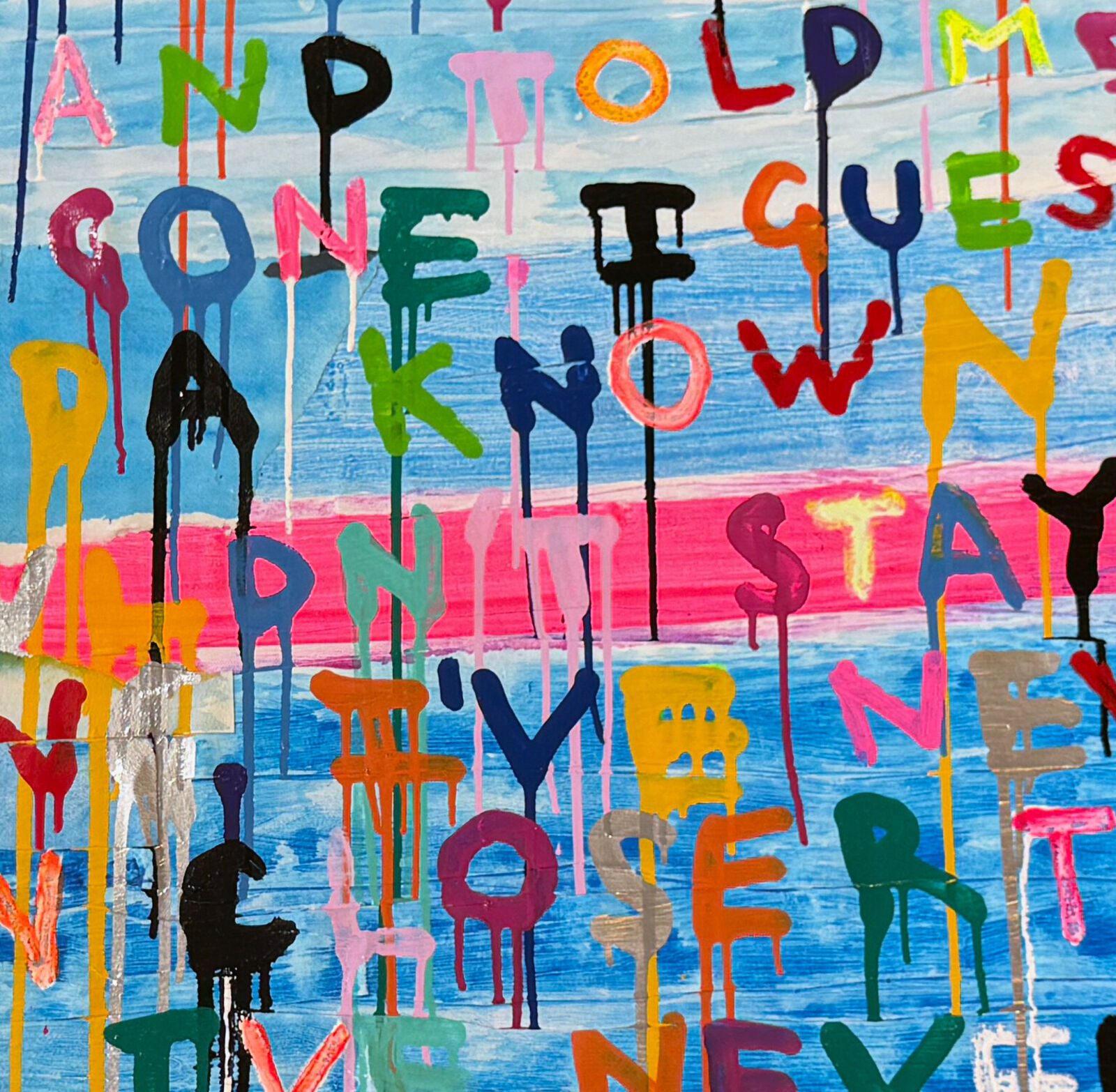 A painting with a quote on it that says, "Under the Lover's Moon."