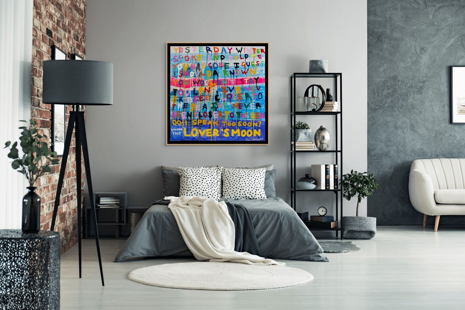 A painting with a quote on it that says, "Under the Lover's Moon."