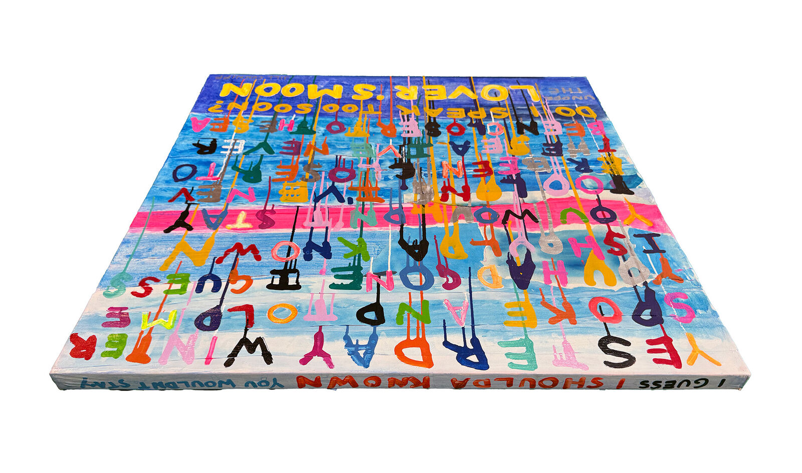 A painting with a quote on it that says, "Under the Lover's Moon."