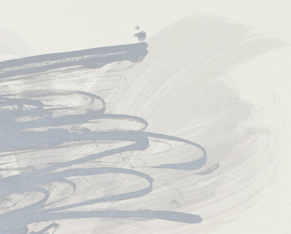 A blue and white painting on a white wall.