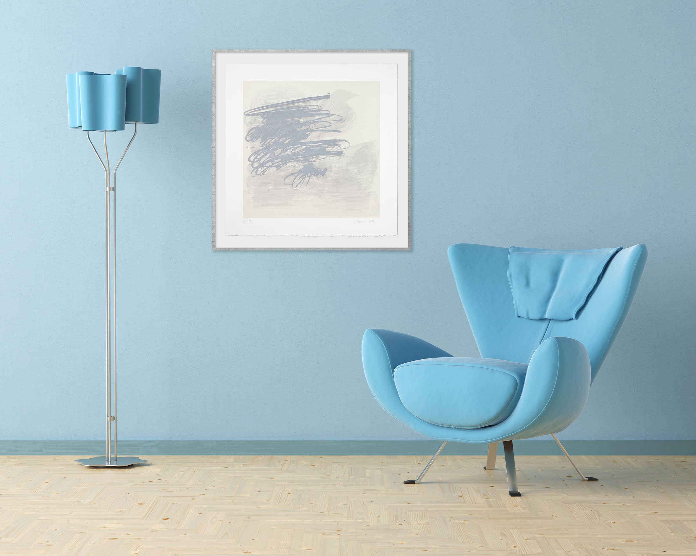 A blue and white painting on a white wall.