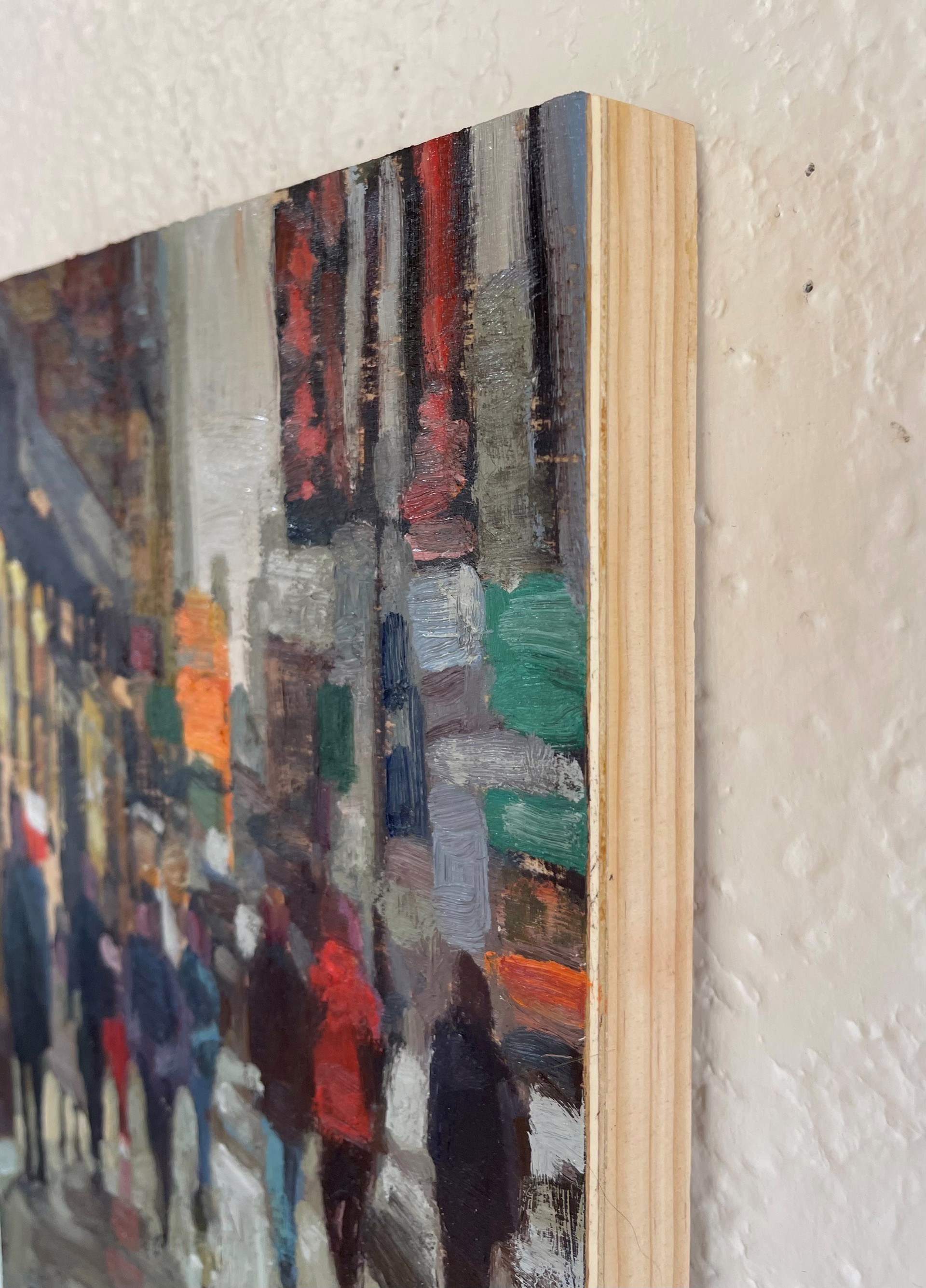 A painting of people walking down a city street.