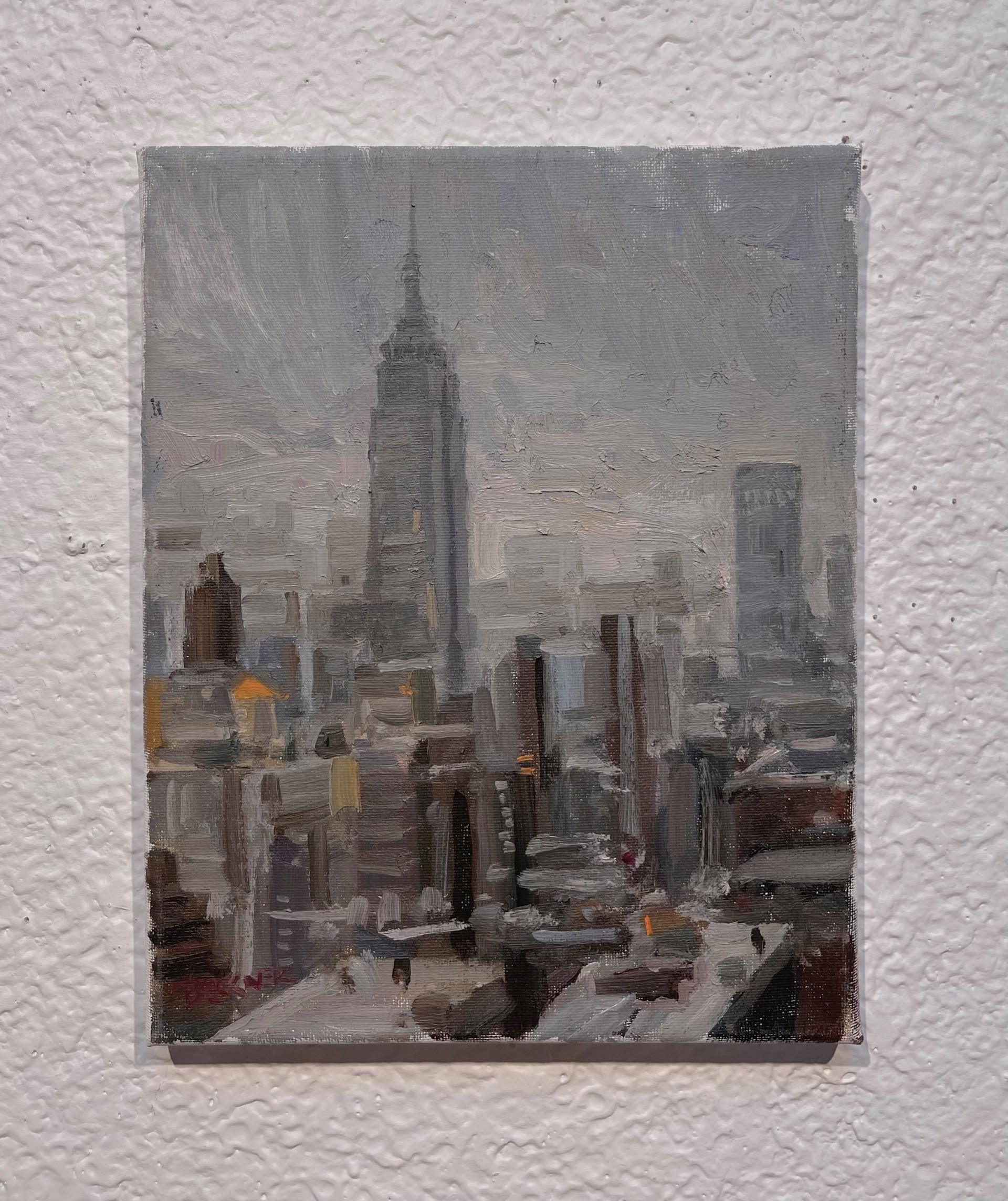 A painting of the Empire State Building in New York City.